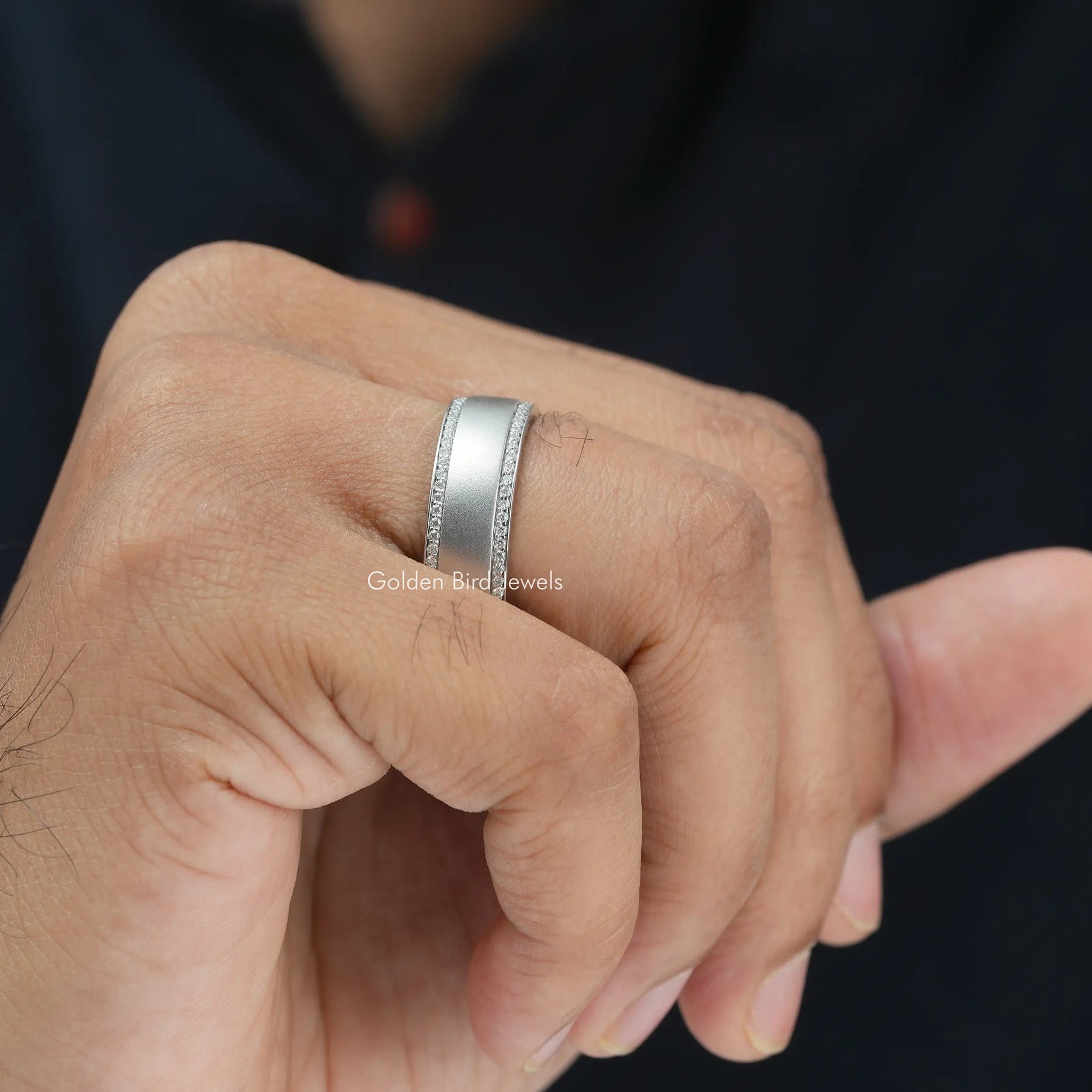 Close view of moissanite ring in secure setting