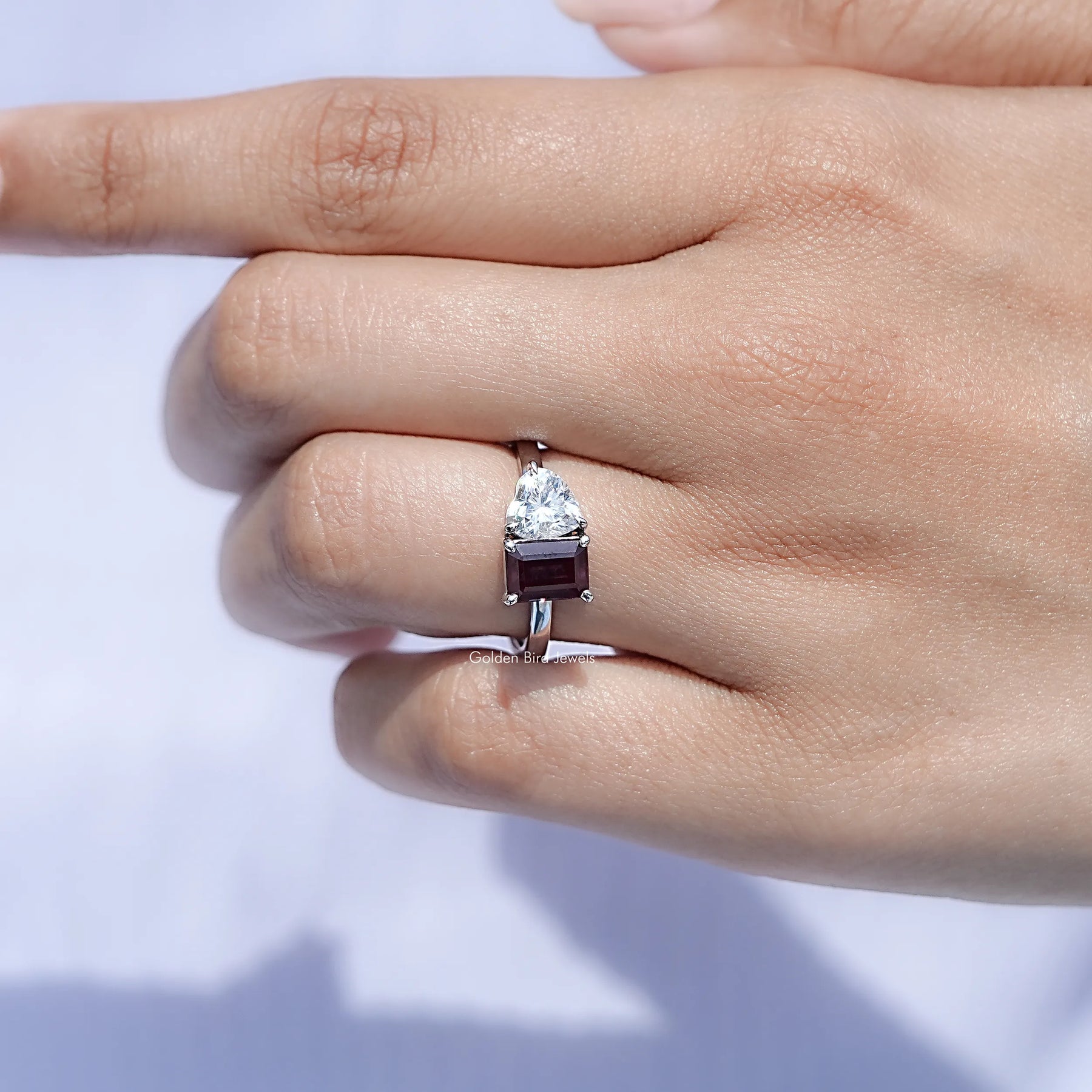 View of Heart Moissanite Toi Et Moi Ring in prongs setting