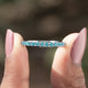 Front view of Aquamarine Blue Round Gemstone Eternity Band