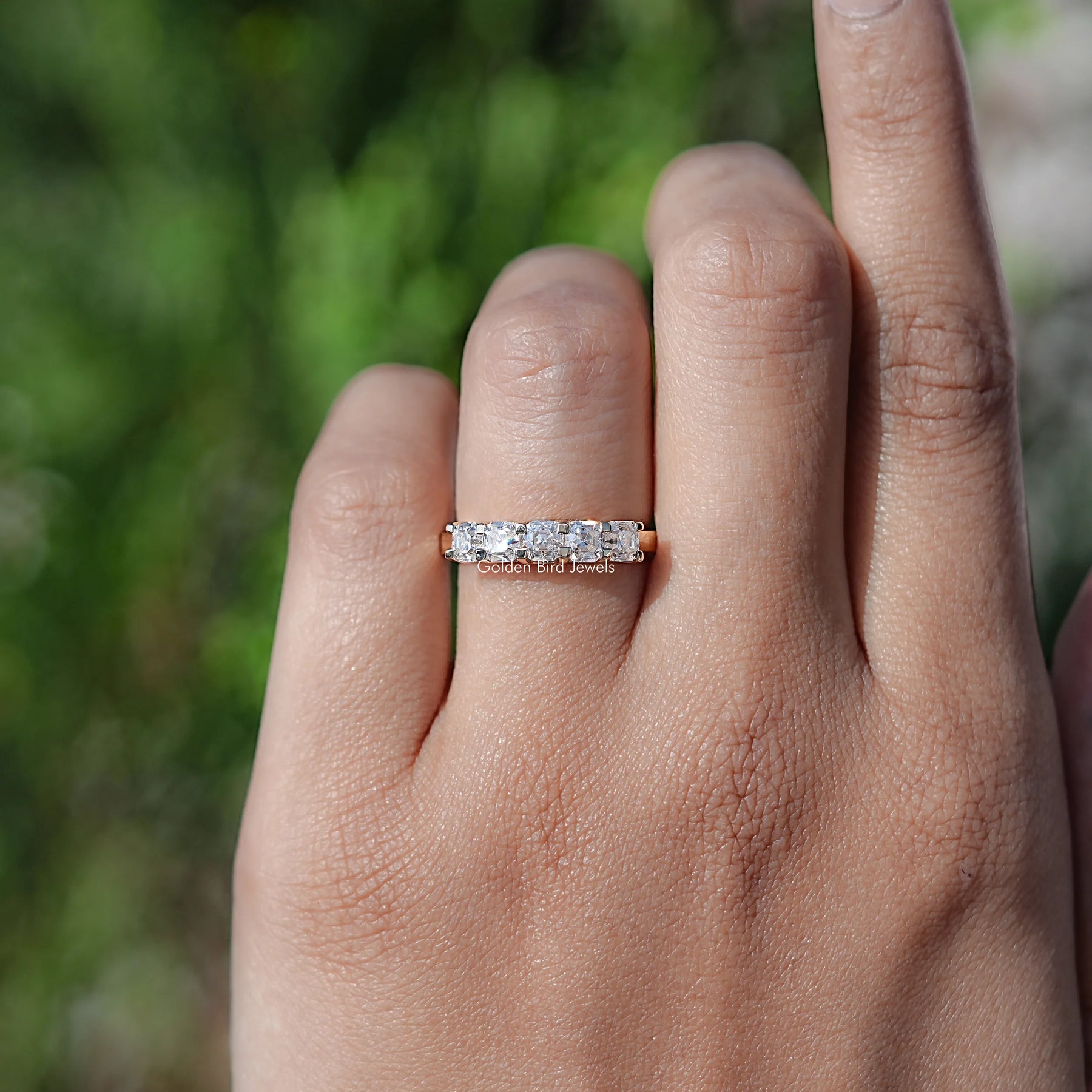 In finger front view of Moissanite Engagement Asscher Cut Moissanite