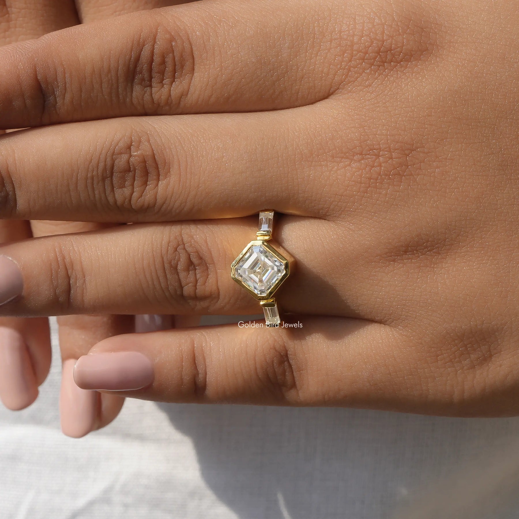 View of 3 Stone Asscher Cut Diamond Engagement Ring In Yellow Gold