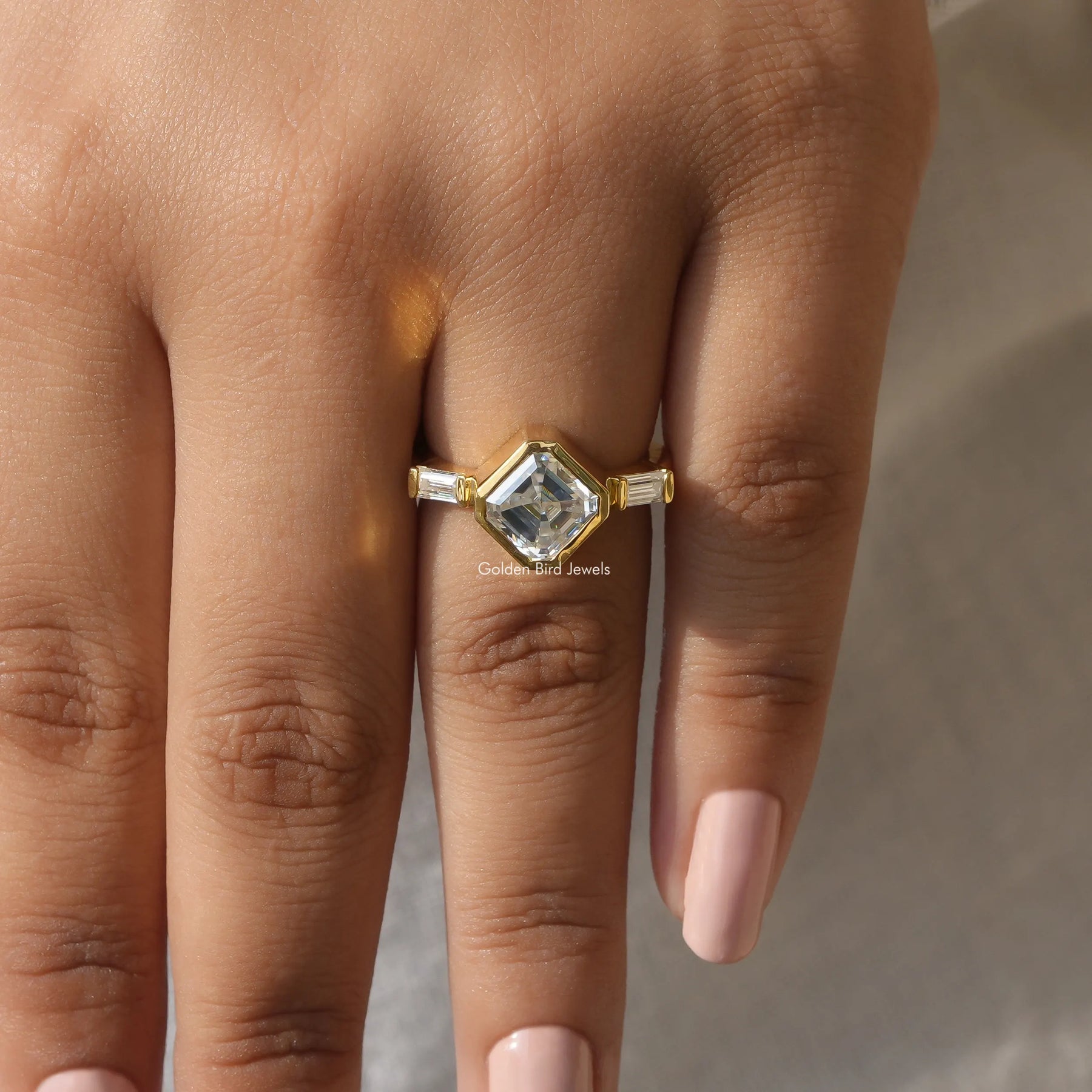 Close-Up View of Asscher Cut Lab Diamond Ring In Yellow Gold