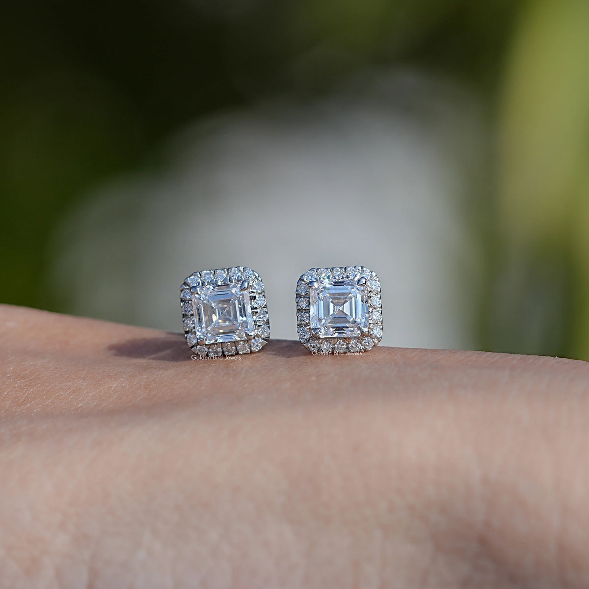 In Hand View Of asscher cut diamond stud Earring