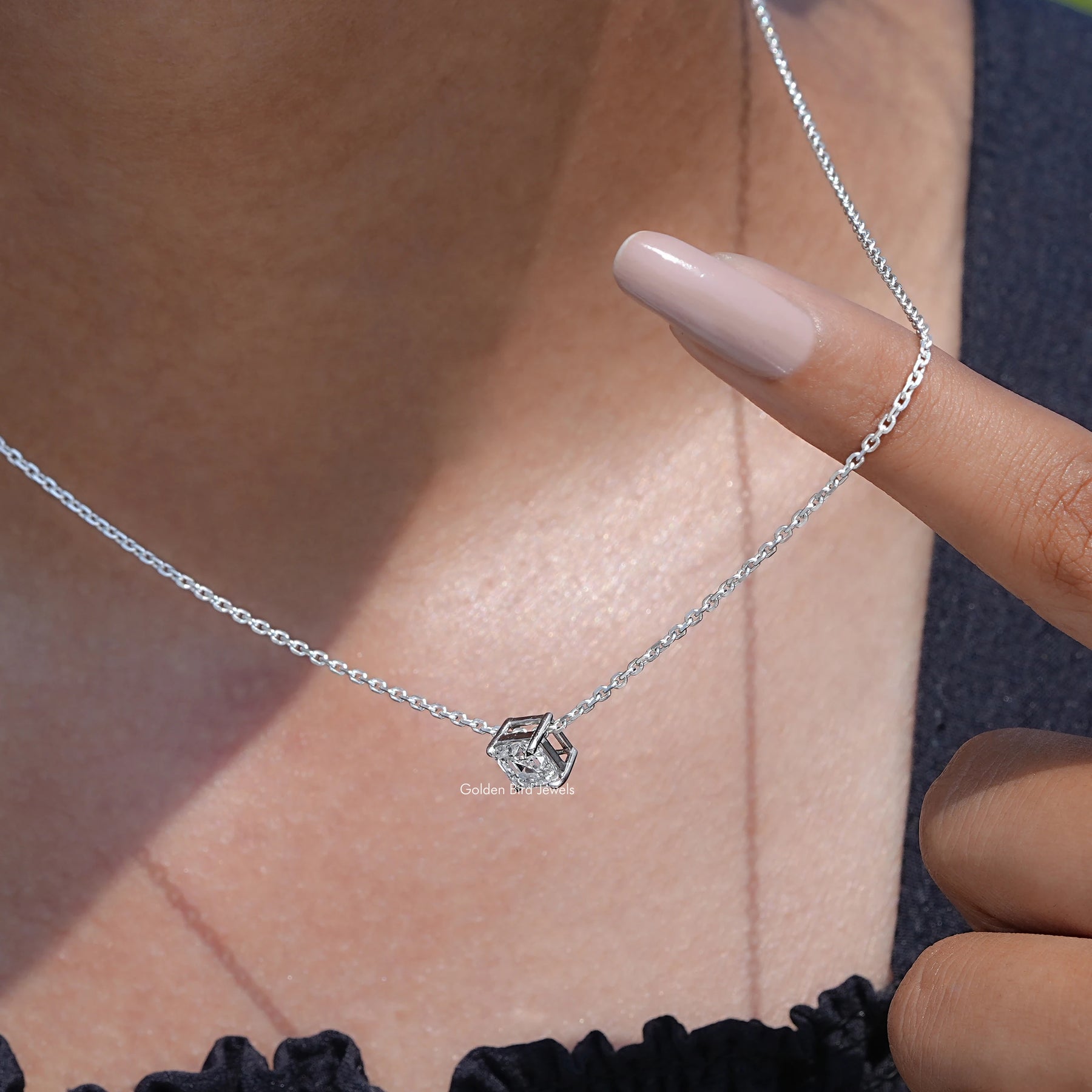 Detailed view of Asscher shape diamond pendant