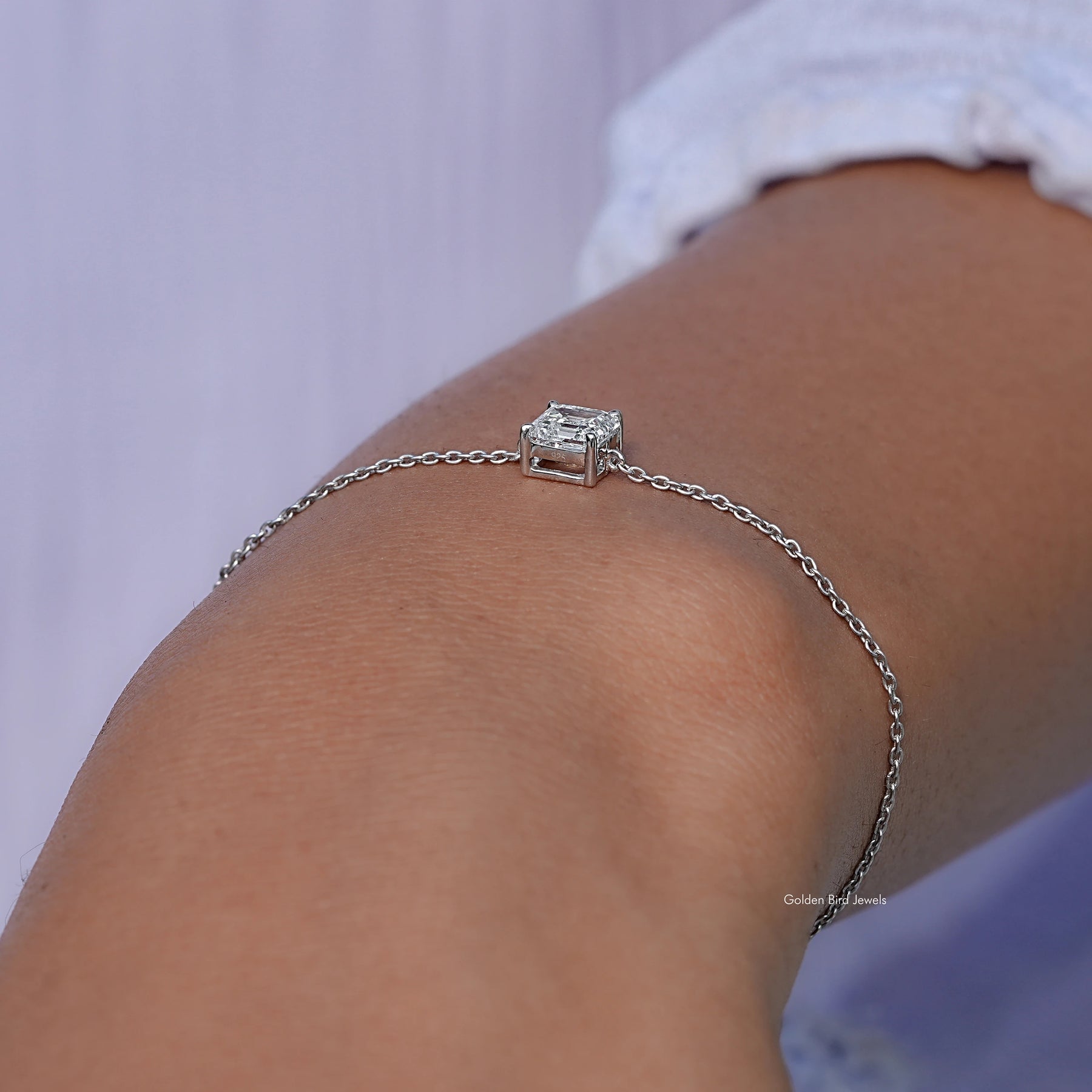 Side view of lab diamond chain bracelet in secure setting