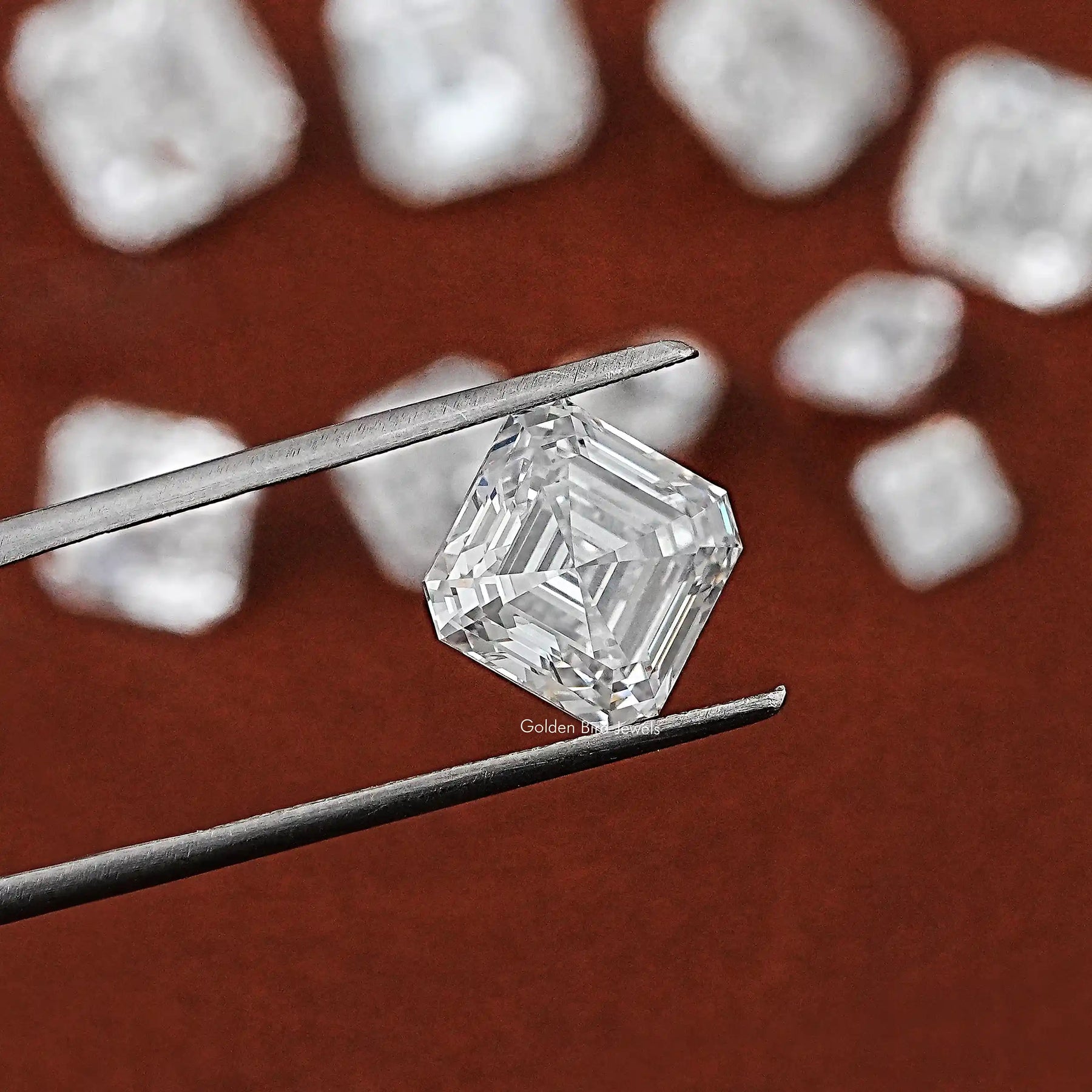 Tweezer Holding the Asscher Cut Lab Grown Loose Diamond