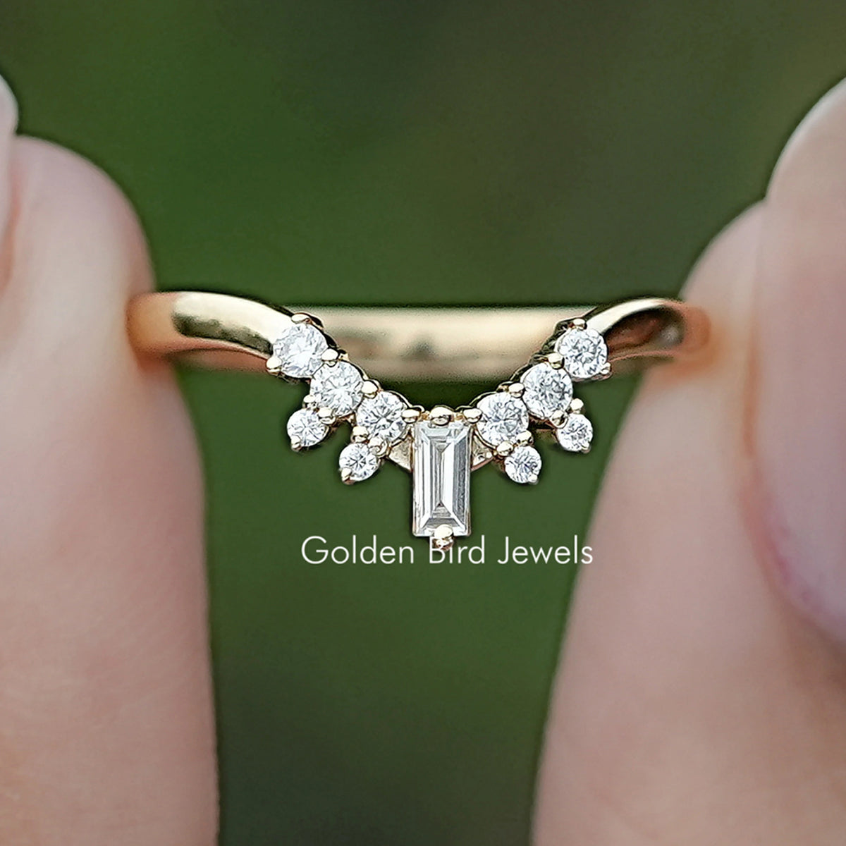 Front view of Baguette And Round Moissanite Chevron Band