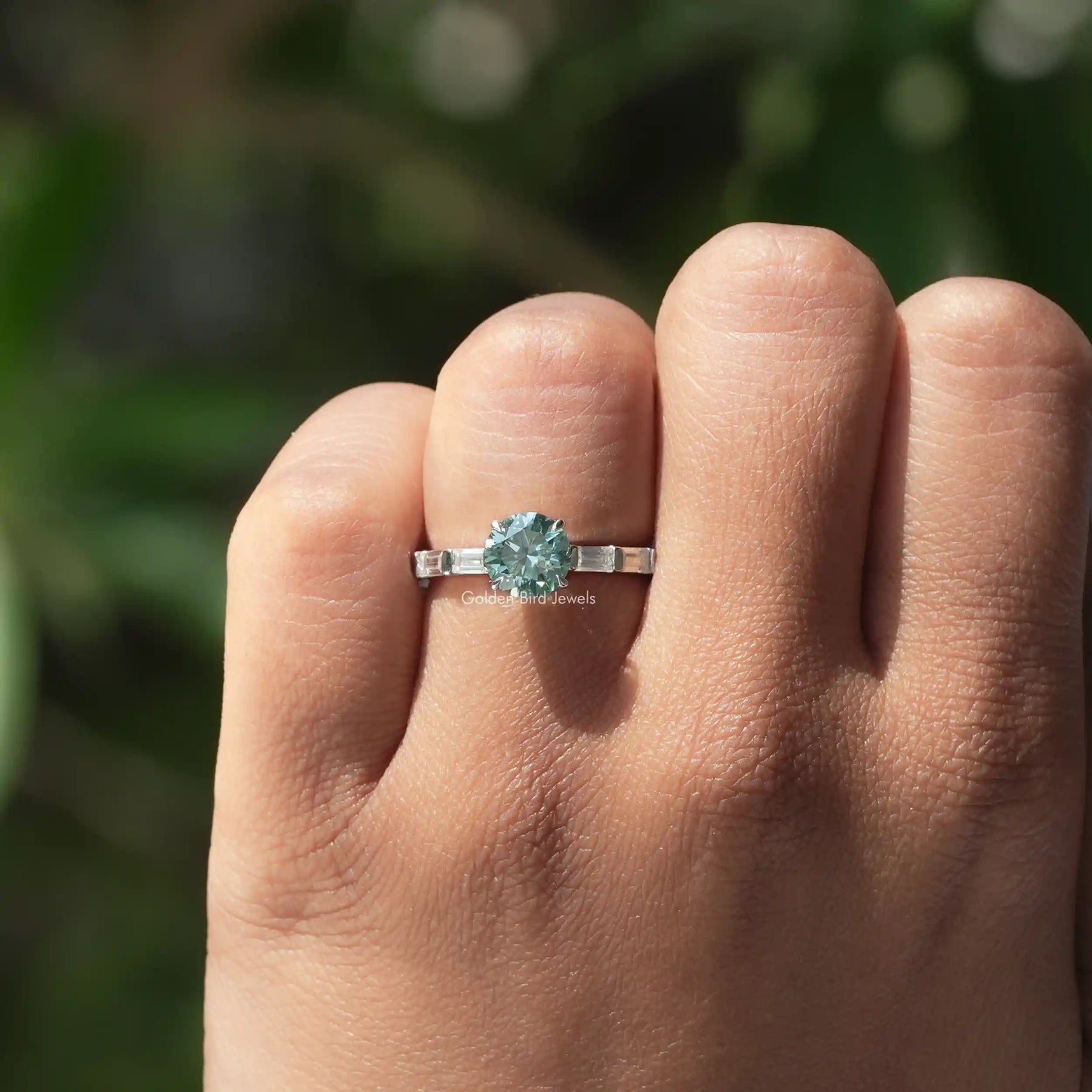 Detailed View Of Moissanite Baguette And Round Cut Accent Stone Ring In White Gold