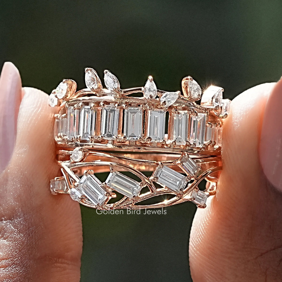 Front view of Baguette Cut Moissanite Bridal Ring Set in two fingers