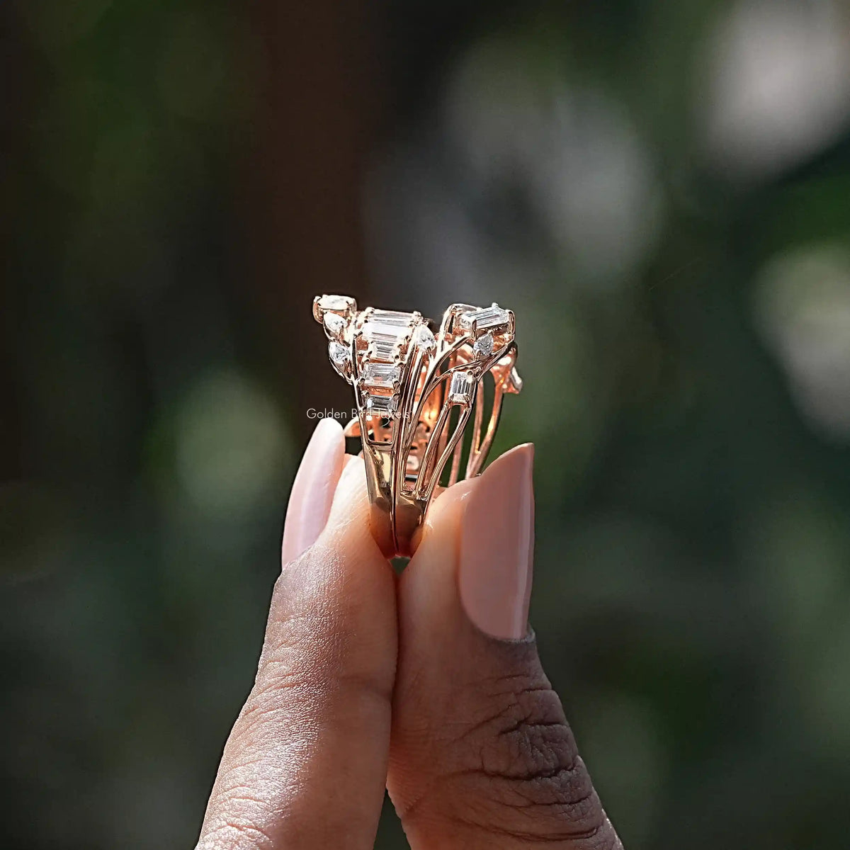 Side View of Baguette Cut Moissanite Bridal Ring In two fingers