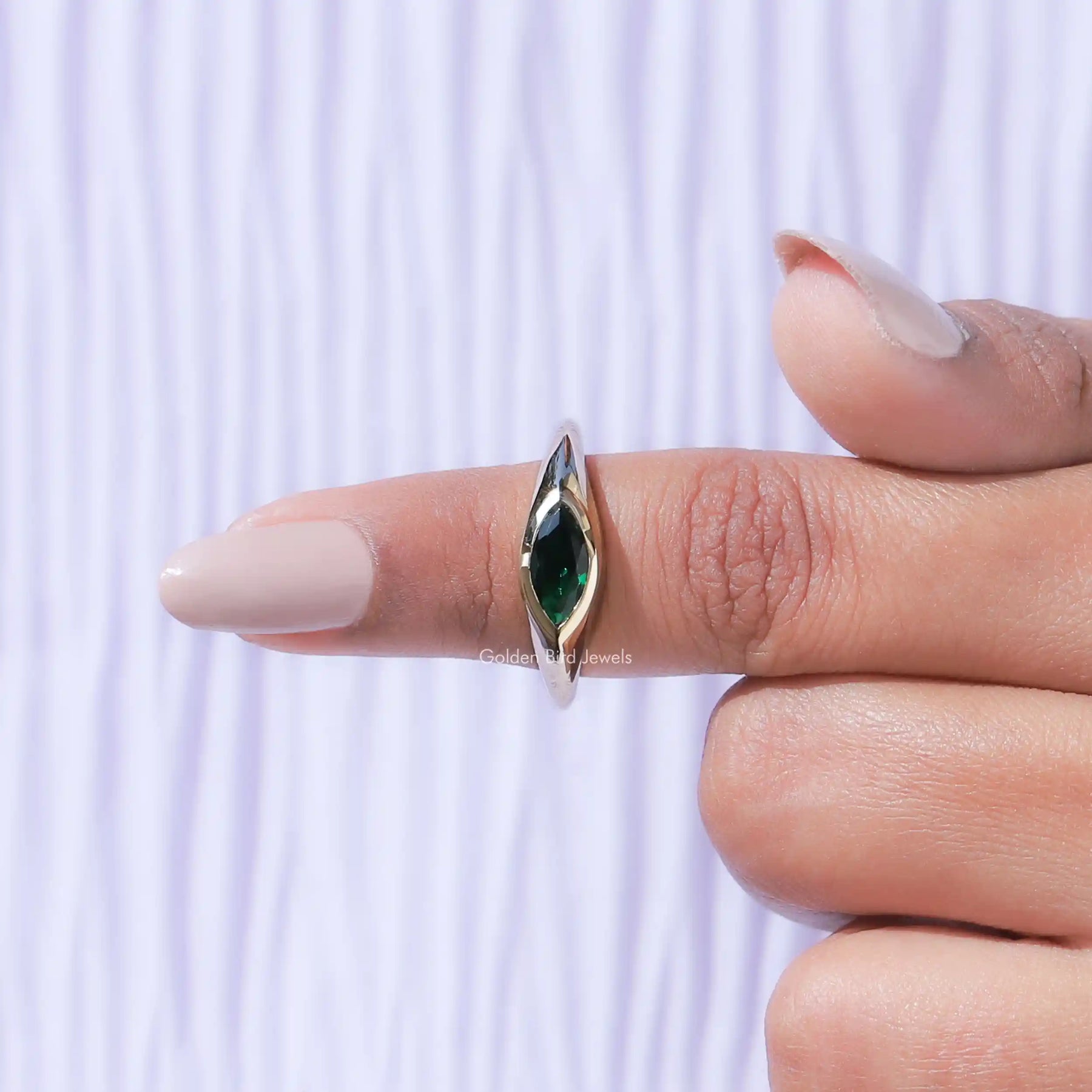 In finger front View of Moissanite Marquise Cut Solitaire Ring