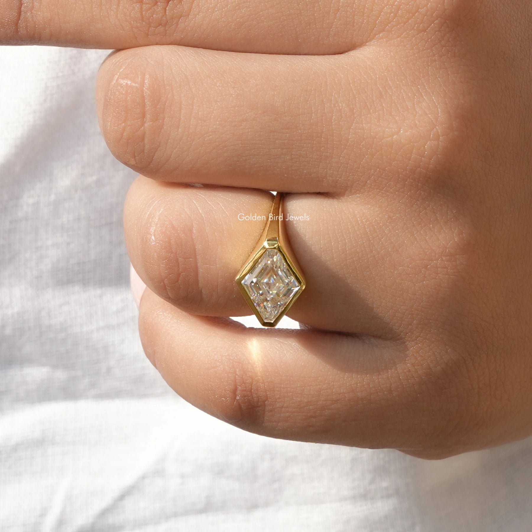 Moissanite Modified Lozenge Cut Ring In finger