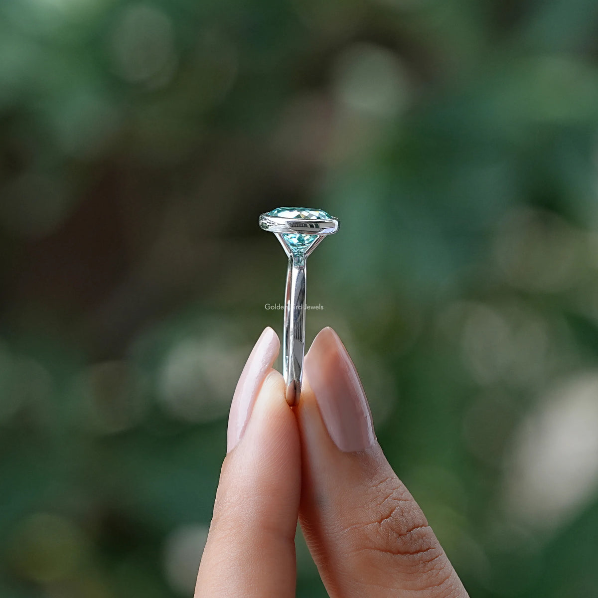 Side View of Blue Portuguese Cut Round Moissanite Ring