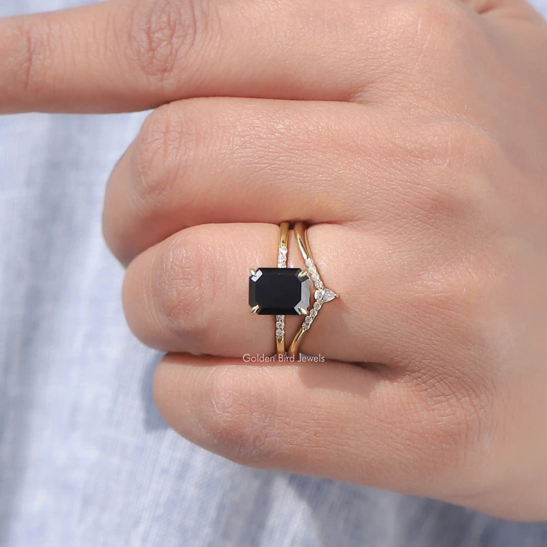 Close-Up View of Emerald Cut Moissanite Bridal Ring In White Gold