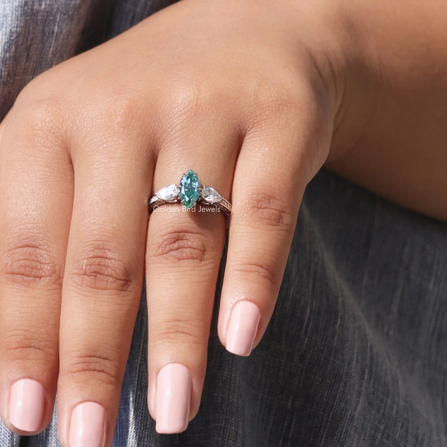 Detailed View Of Three Stone Marquise Cut Accent Stone Ring In White Gold