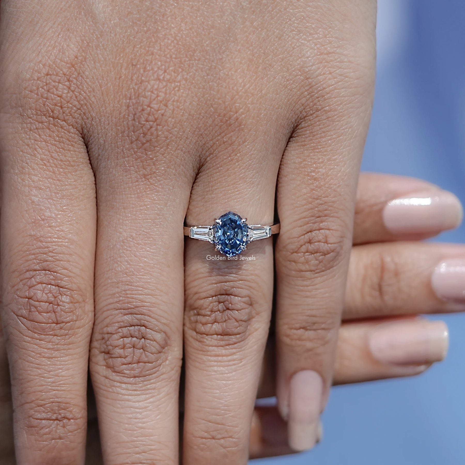 View of solitaire Oval Moissanite ring in prongs setting