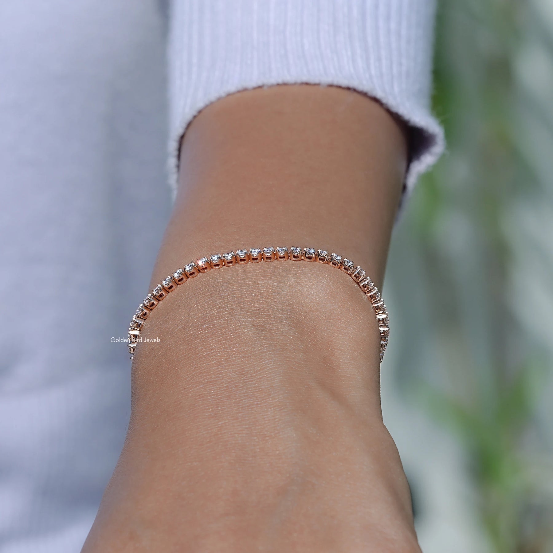 Side View of Round Cut Lab Diamond Tennis Bracelet In Yellow Gold