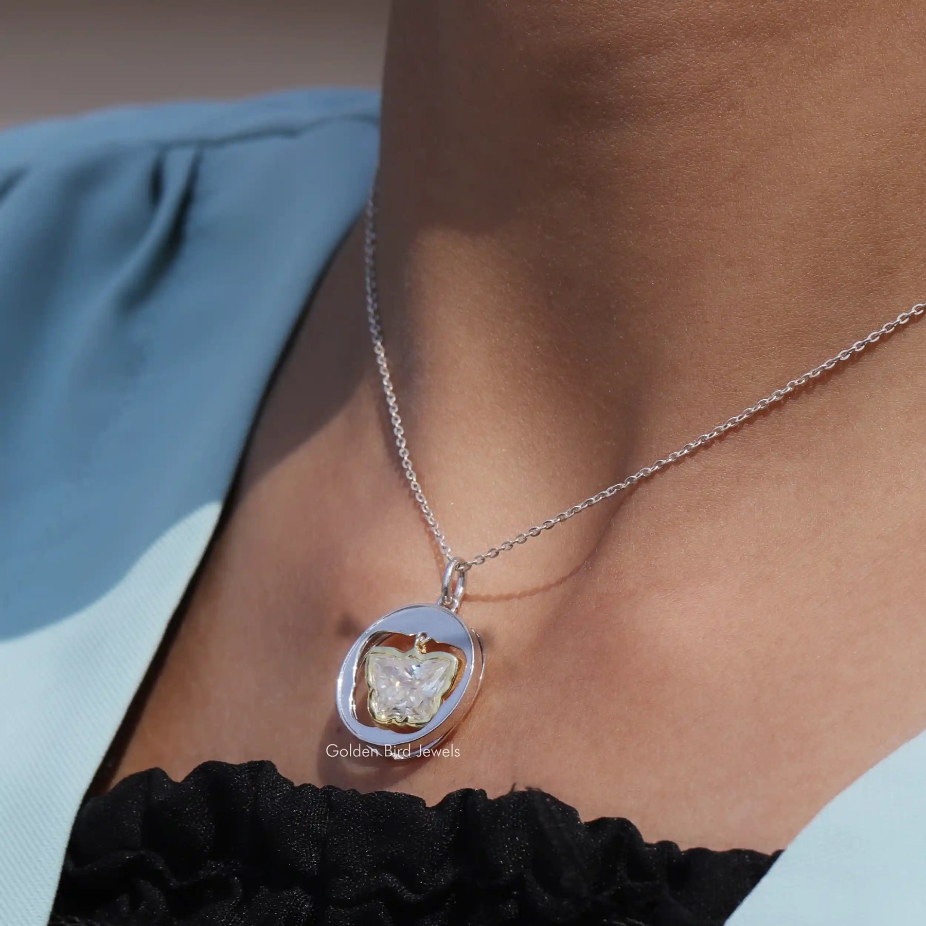 Side view of bezel set pendant In white Gold