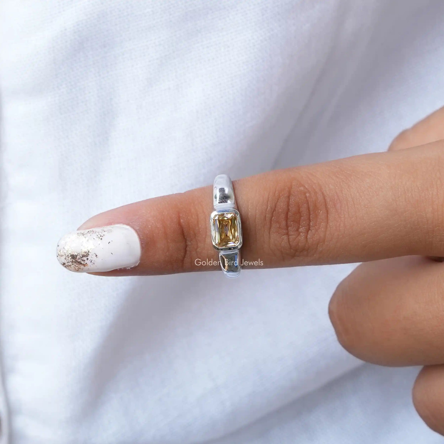 In finger front View of Criss Cut Solitaire Engagement Ring