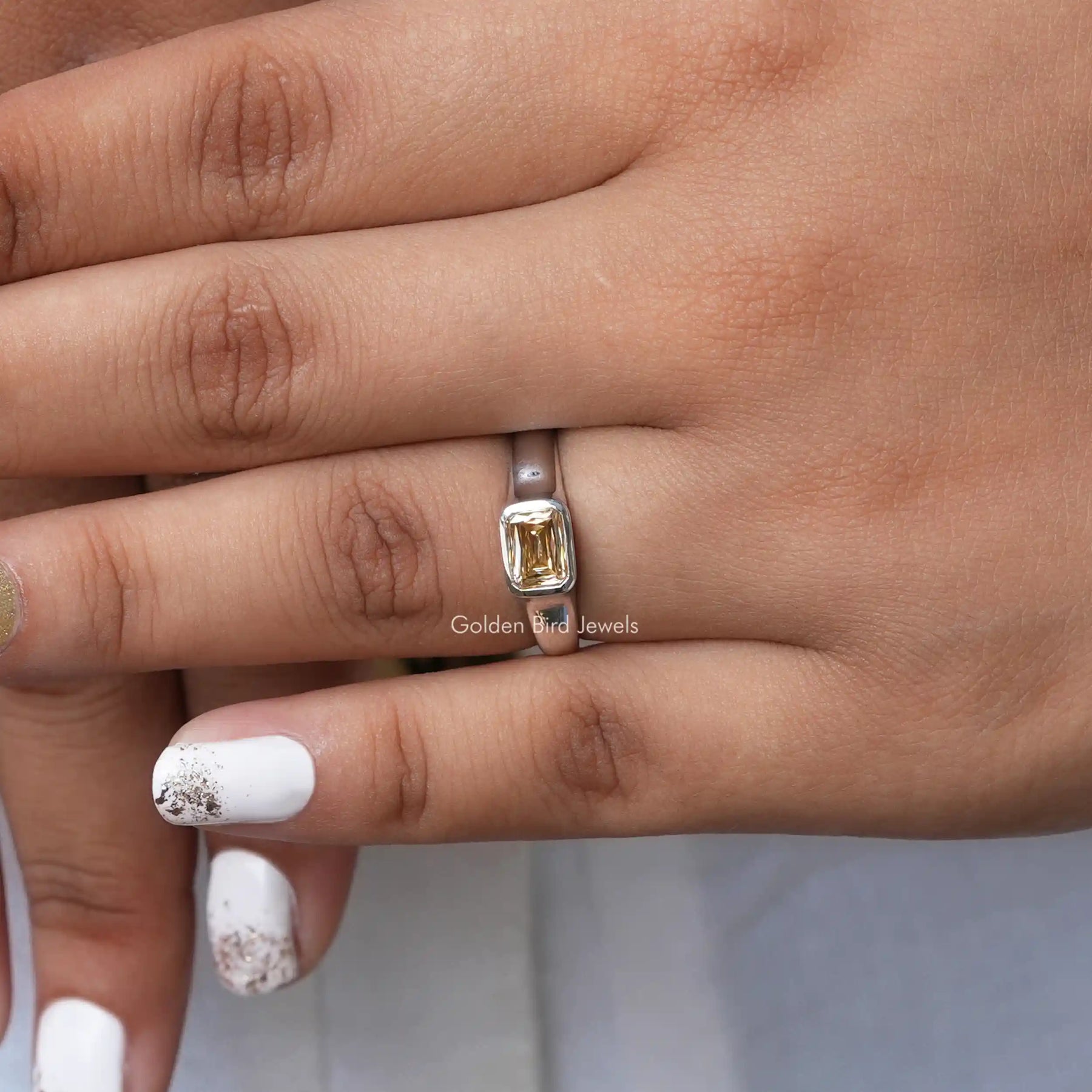 Close-Up View of Solitaire Criss Cut Moissanite ring In White Gold
