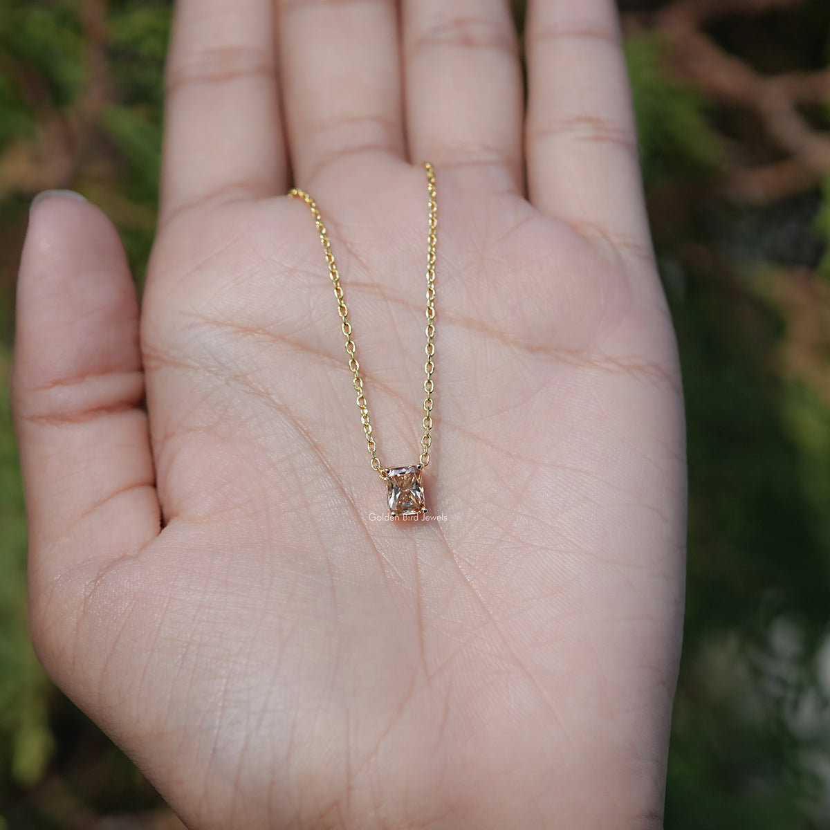 Side View of Champagne Emerald Cut Moissanite Solitaire Pendant