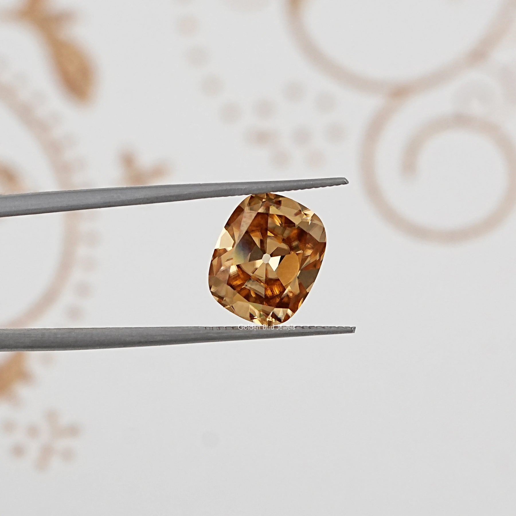 In Tweezer View Of Old Mine Cushion Loose Moissanite Stone