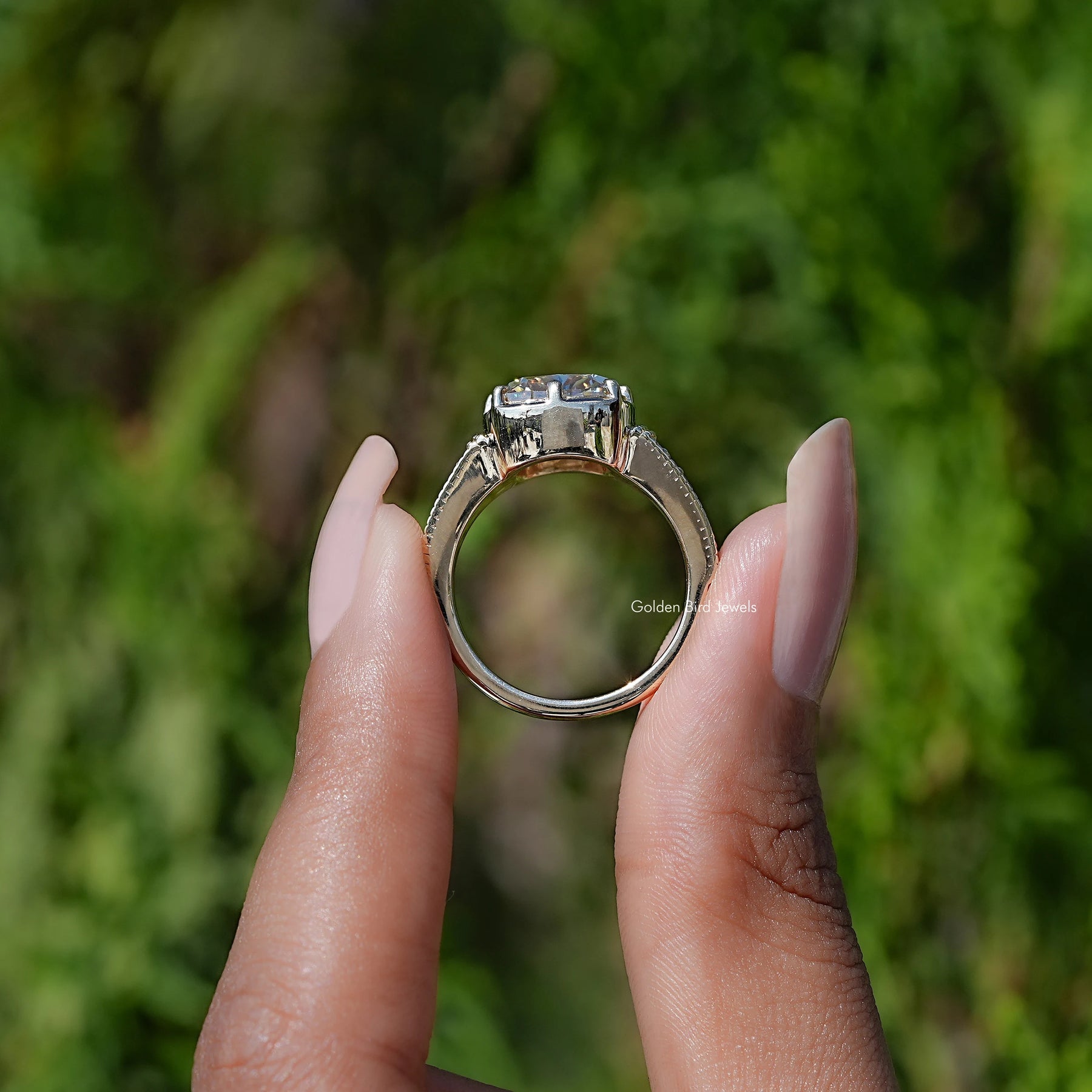 Back view of Filigree Yellow Elongated cushion Moissanite Ring  in secure setting