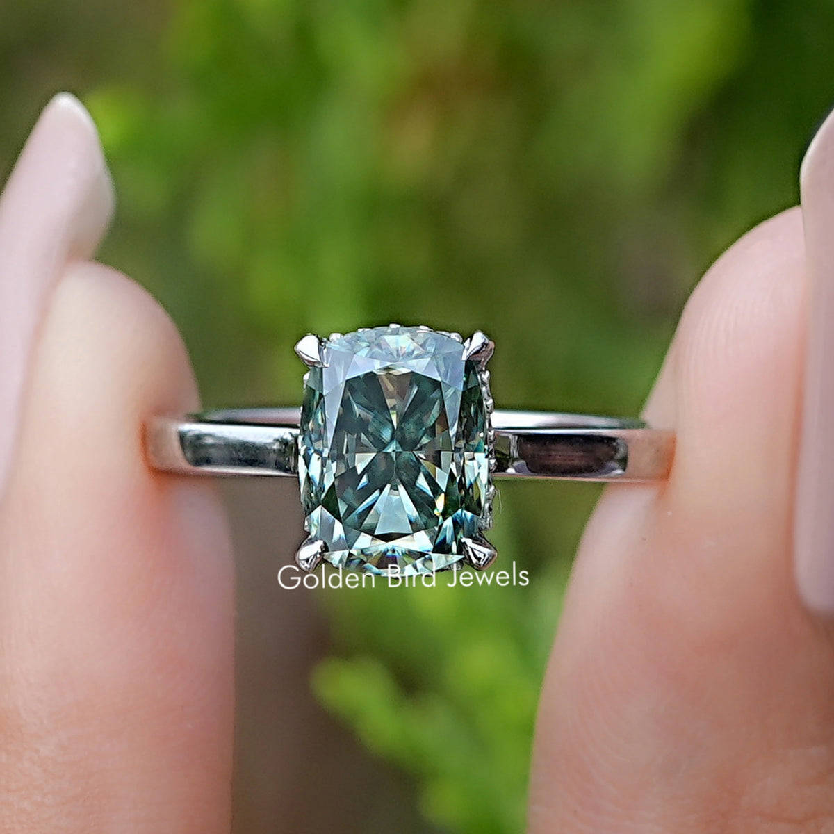 Front view of Green Elongated Cushion Moissanite Hidden Halo Ring