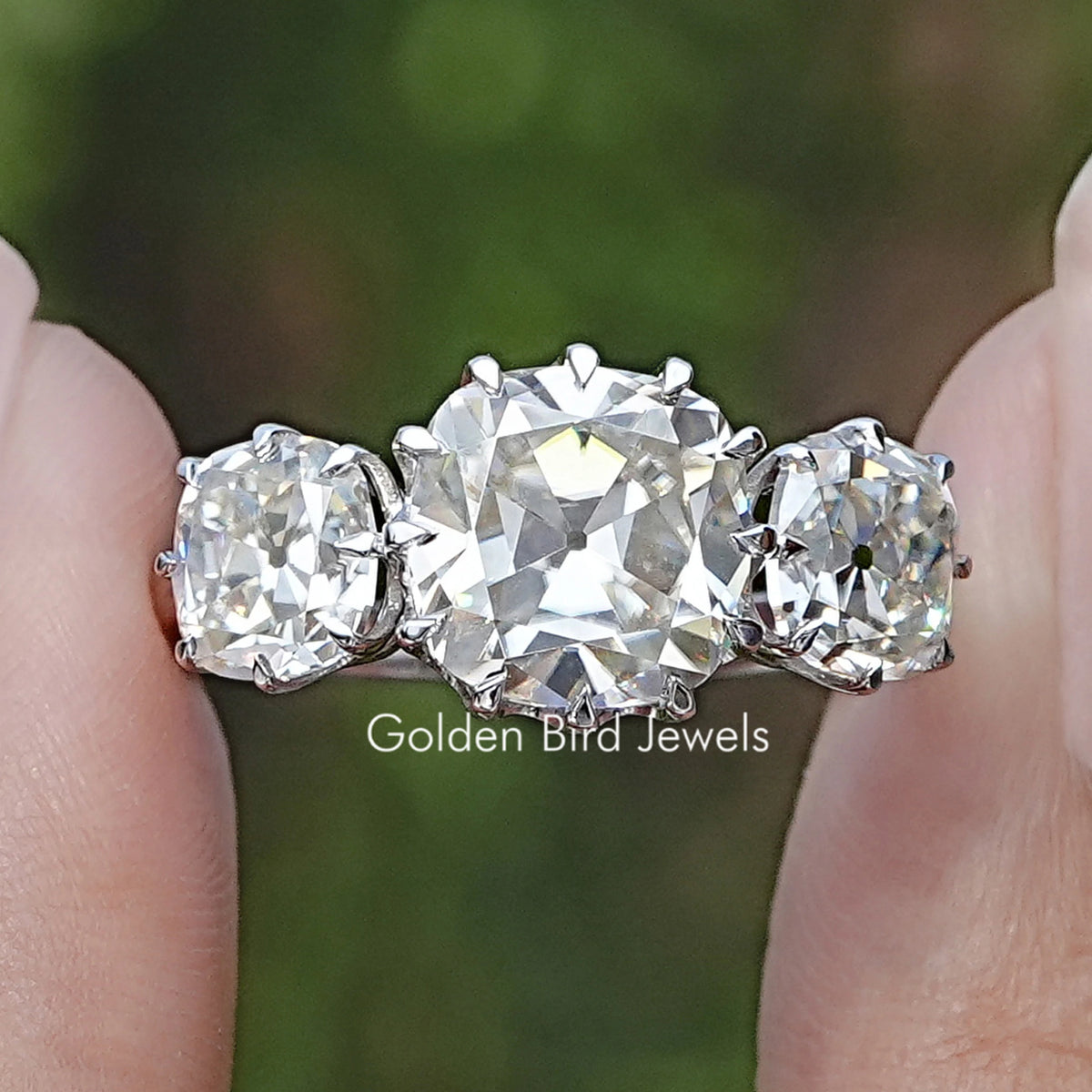 Front view of Old Mine Cushion Three Stone Moissanite Ring