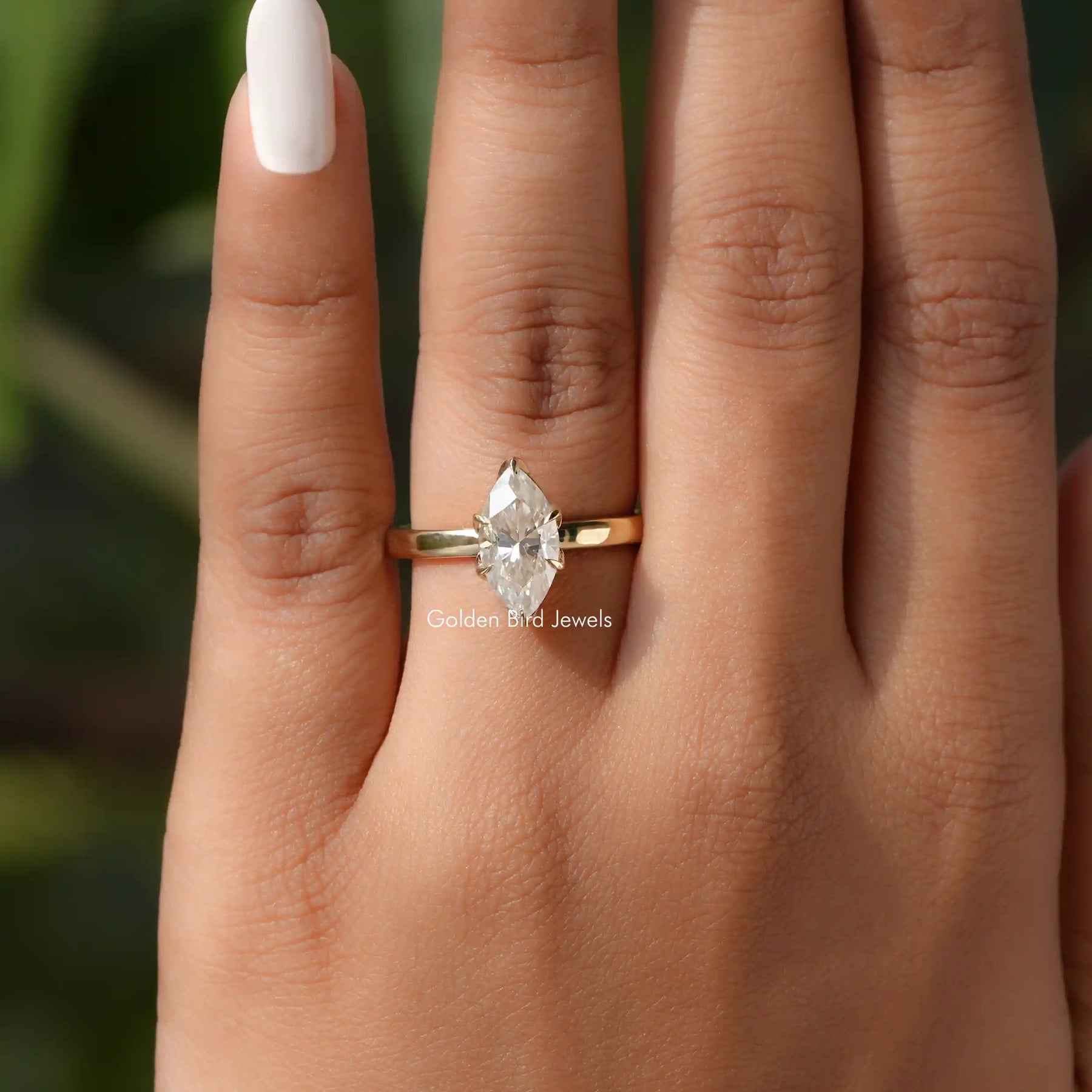 Marquise Cut Solitaire Moissanite Engagement Ring In Yellow Gold