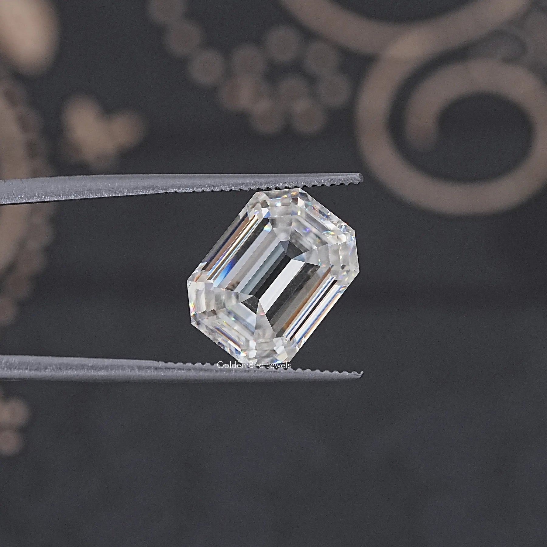 In Tweezer View Of Old Mine Pear Cut Loose Moissanite Stone