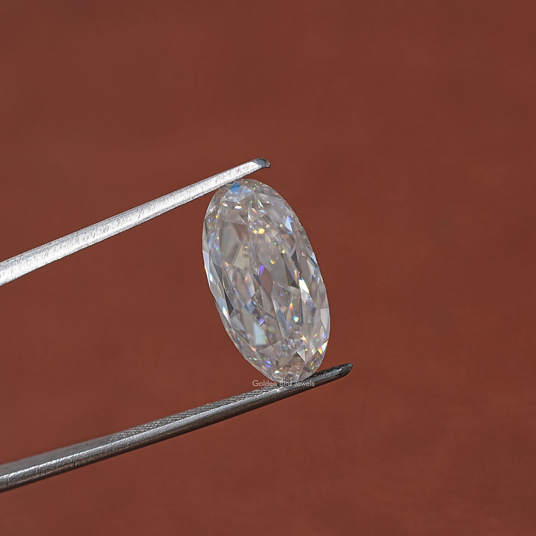In Tweezer View Of Moval Cut Loose Moissanite