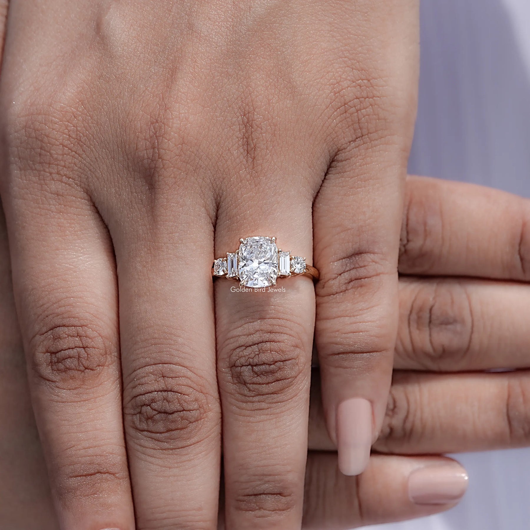 Top view of Cushion And Baguette Diamond Five Stone Ring