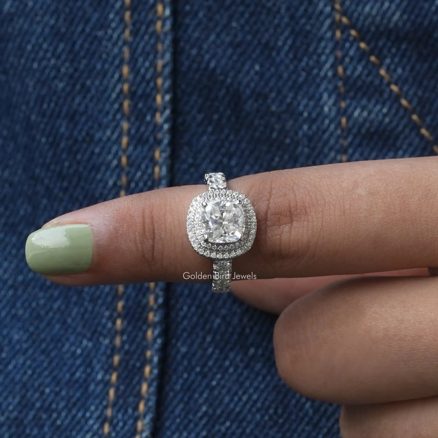 In finger front View of Cushion And Round Cut Double Halo Moissanite Ring