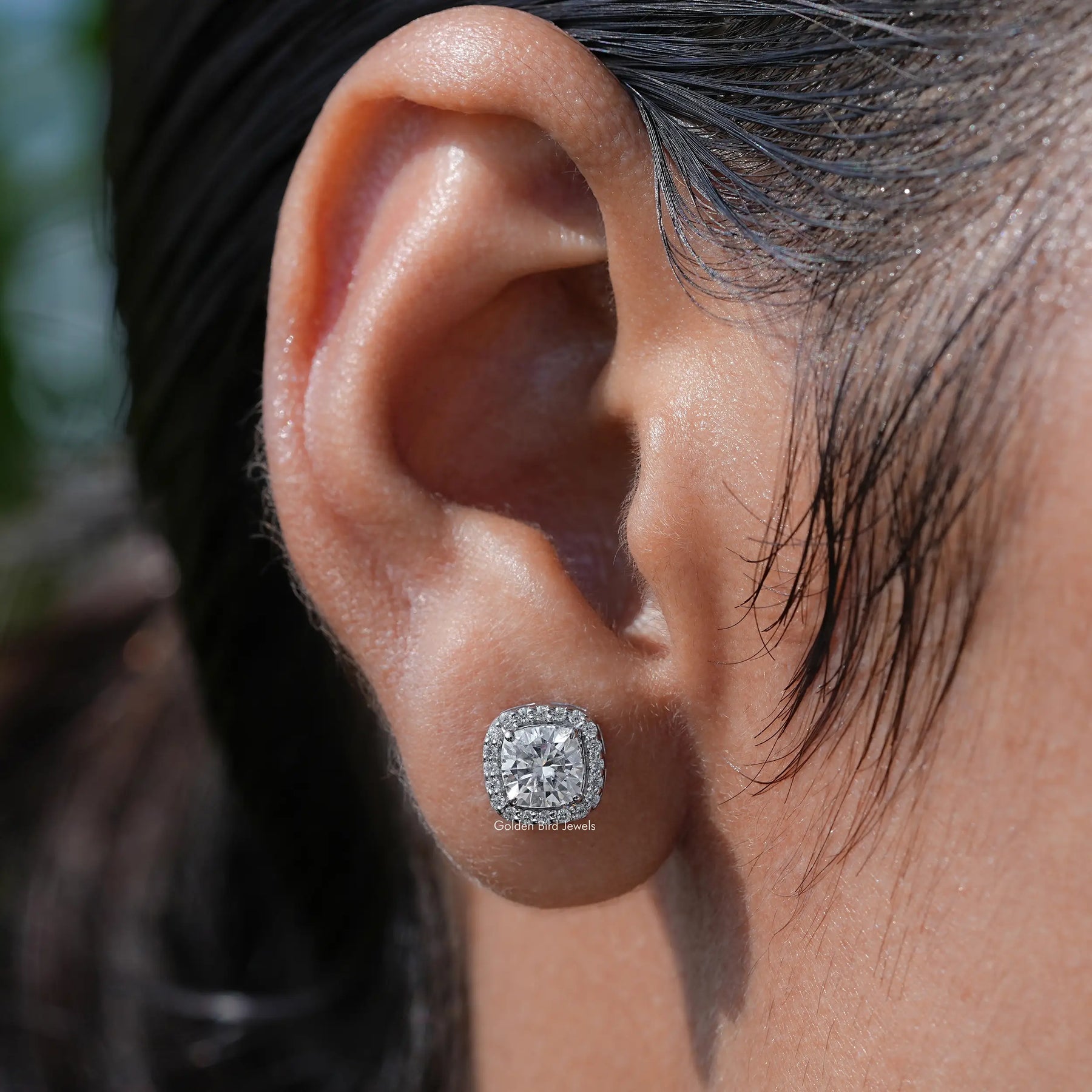 In Ear view of cushion Cut moissanite Stud Earrings