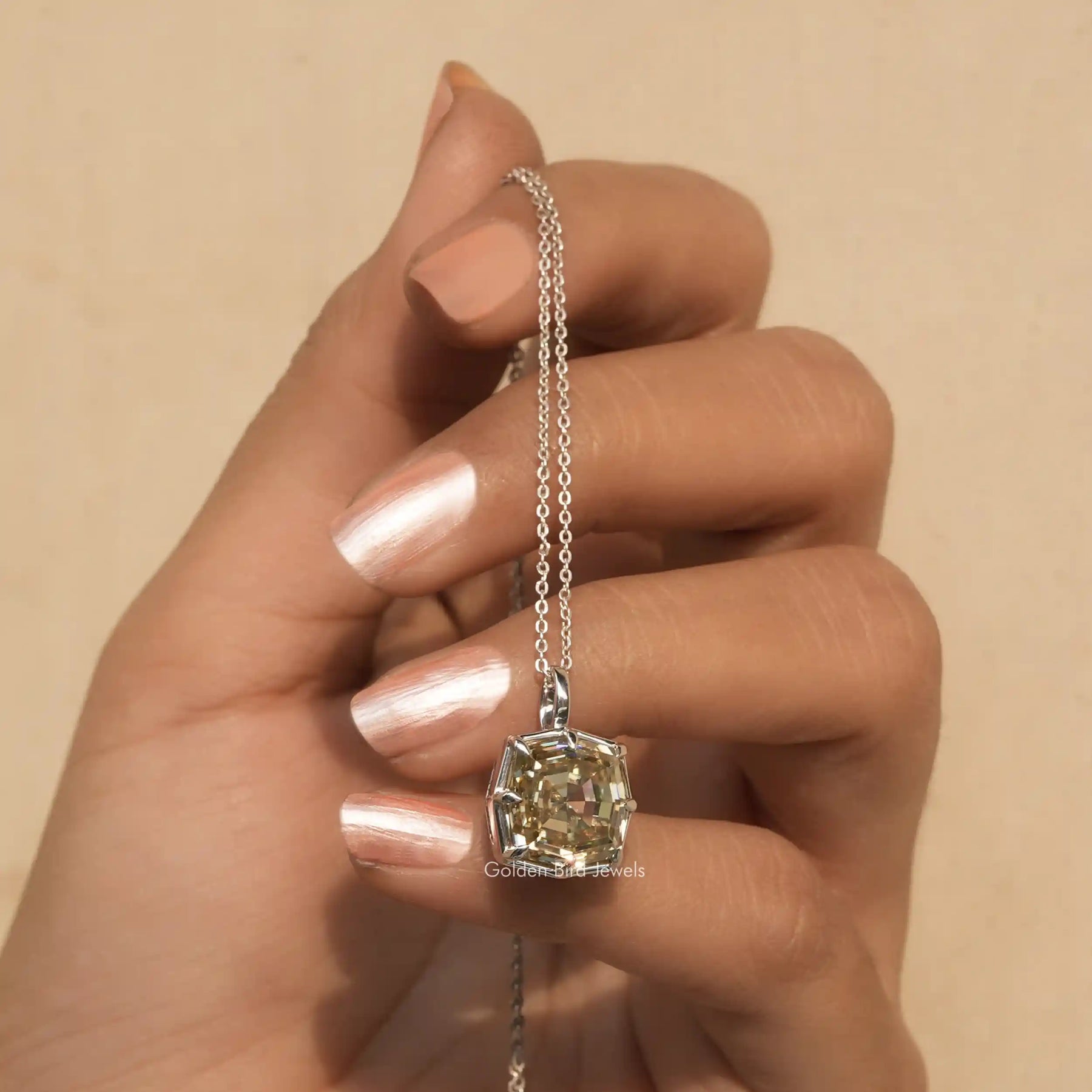 Detailed view of moissanite cushion shape pendant