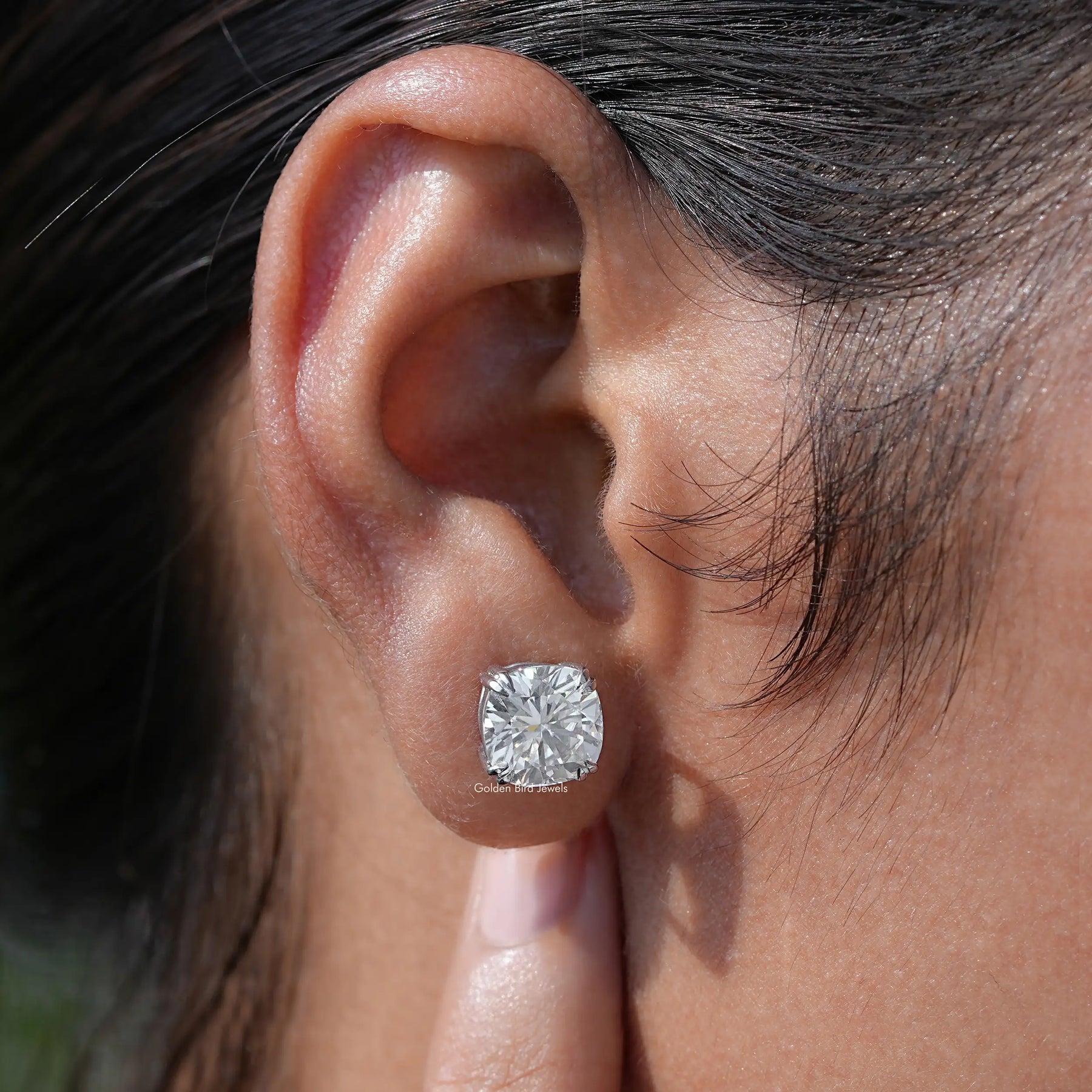 View of Colorless Cushion Cut Moissanite Stud Earrings