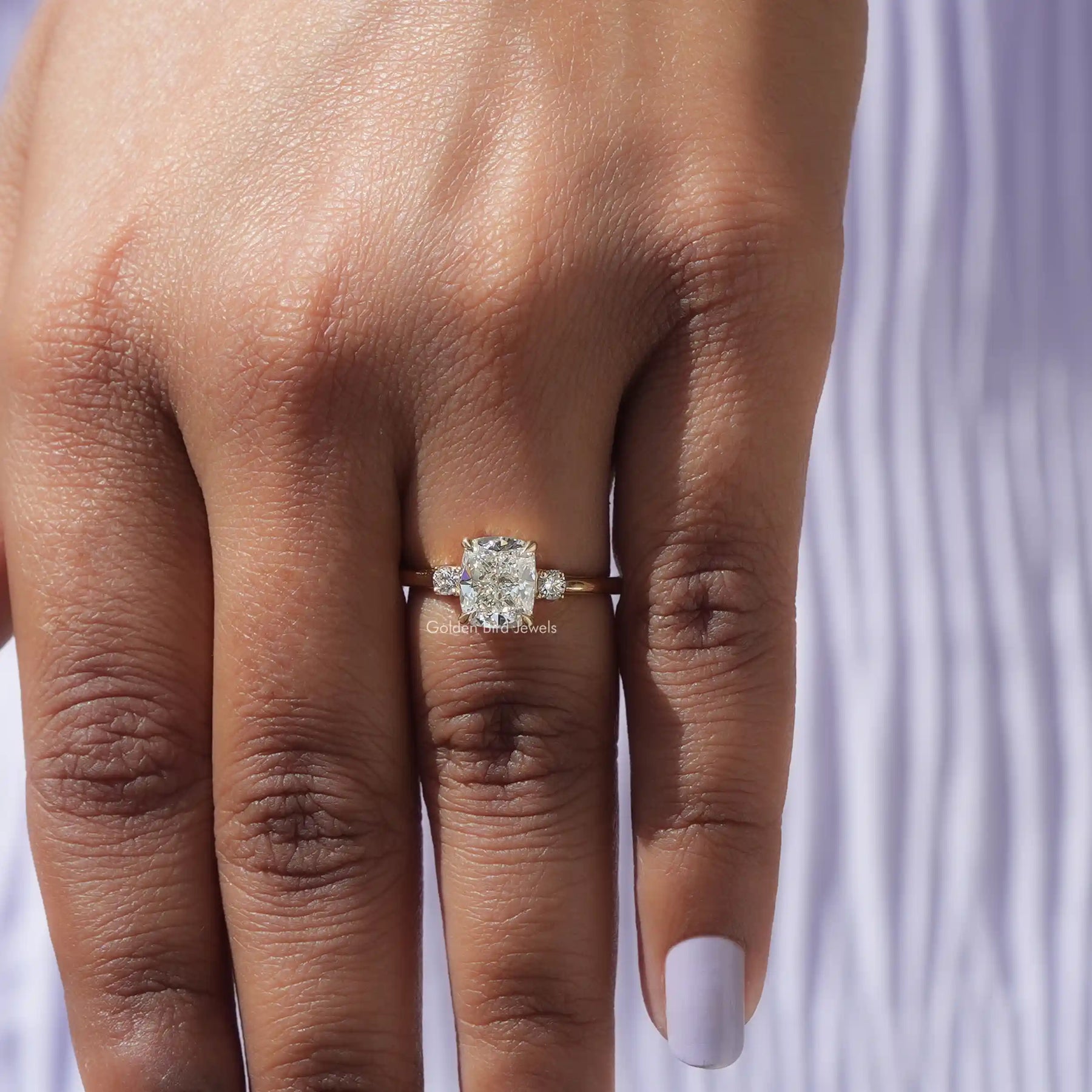 Close-Up View of 3 Stone Cushion Cut Lab Diamond Engagement Ring