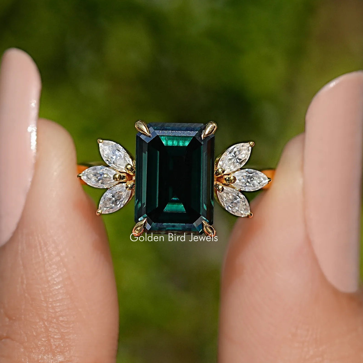 Dark Green Emerald And Marquise Cut Engagement Ring