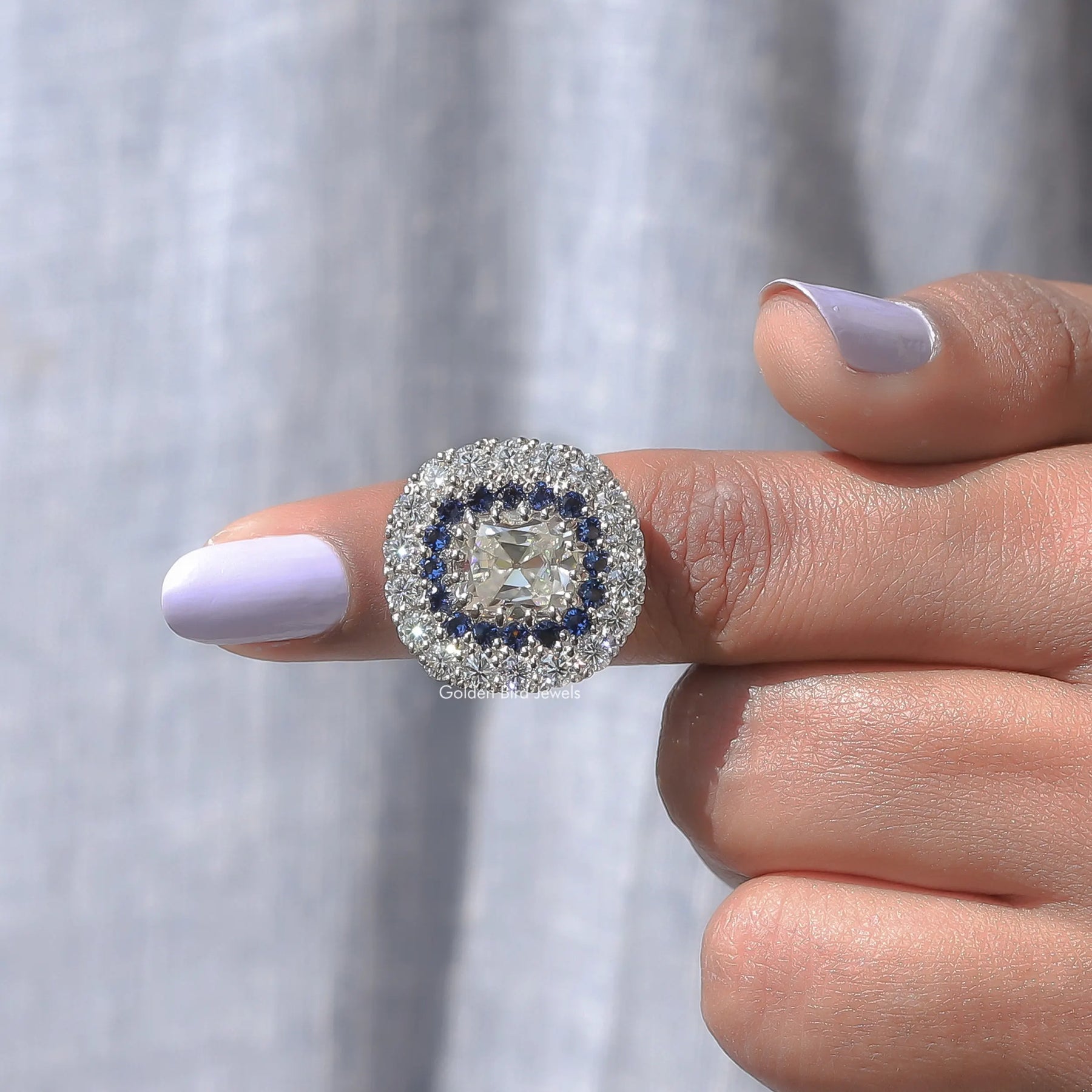 In finger front View of Moissanite Old Mine Cushion Cut Ring In White Gold