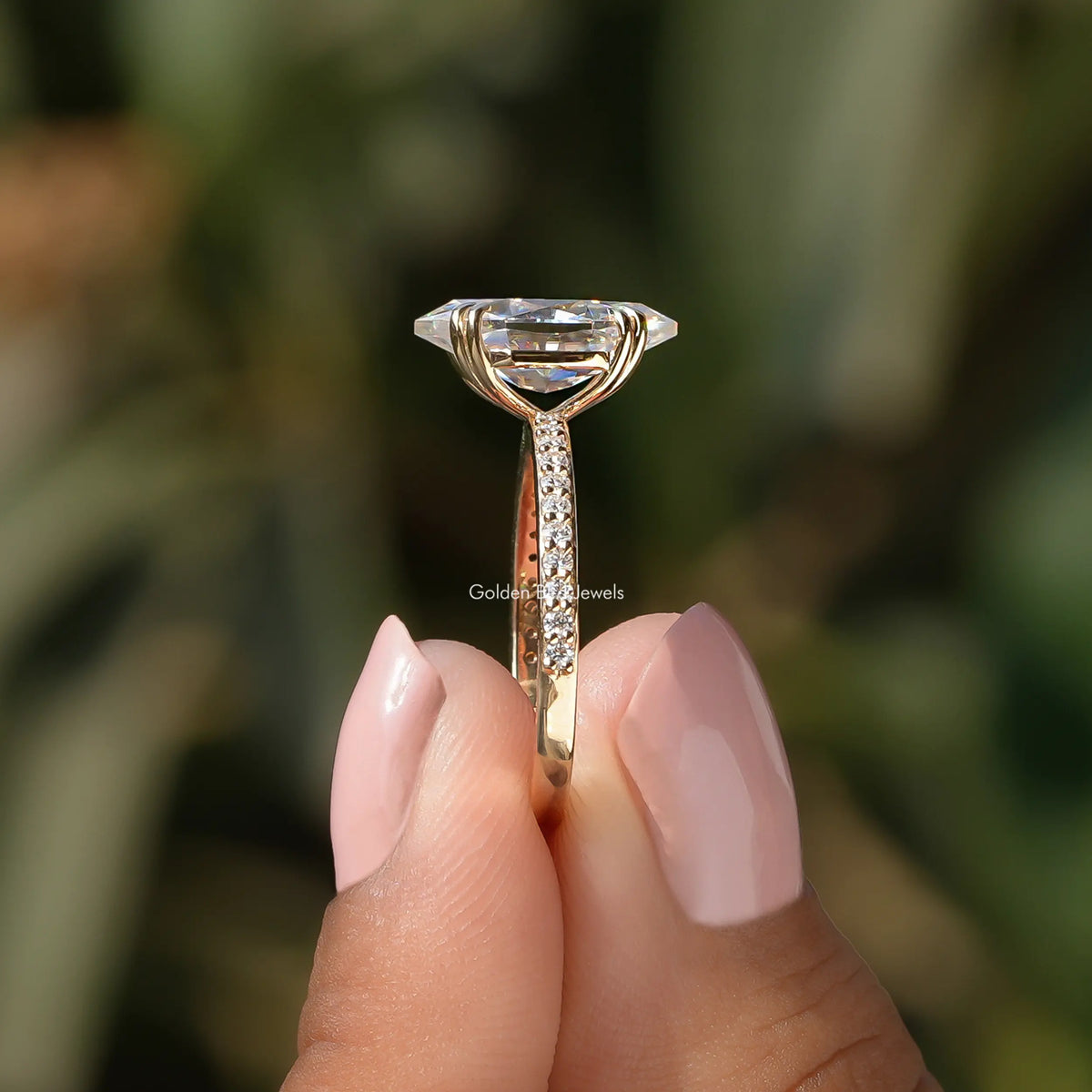 Side view of a solitaire marquies engagement ring