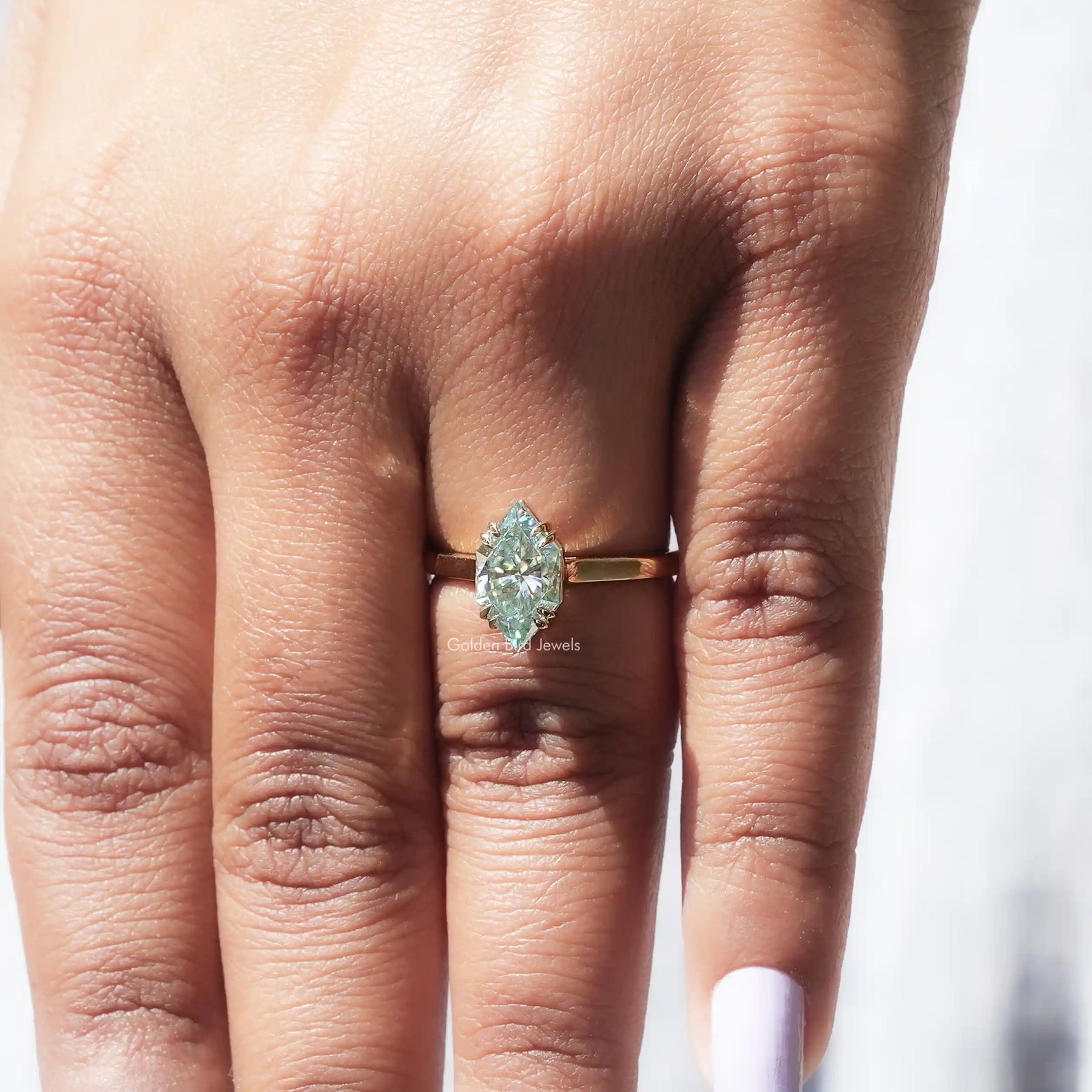 Detailed view of moissanite ring crafted in 8 prongs setting