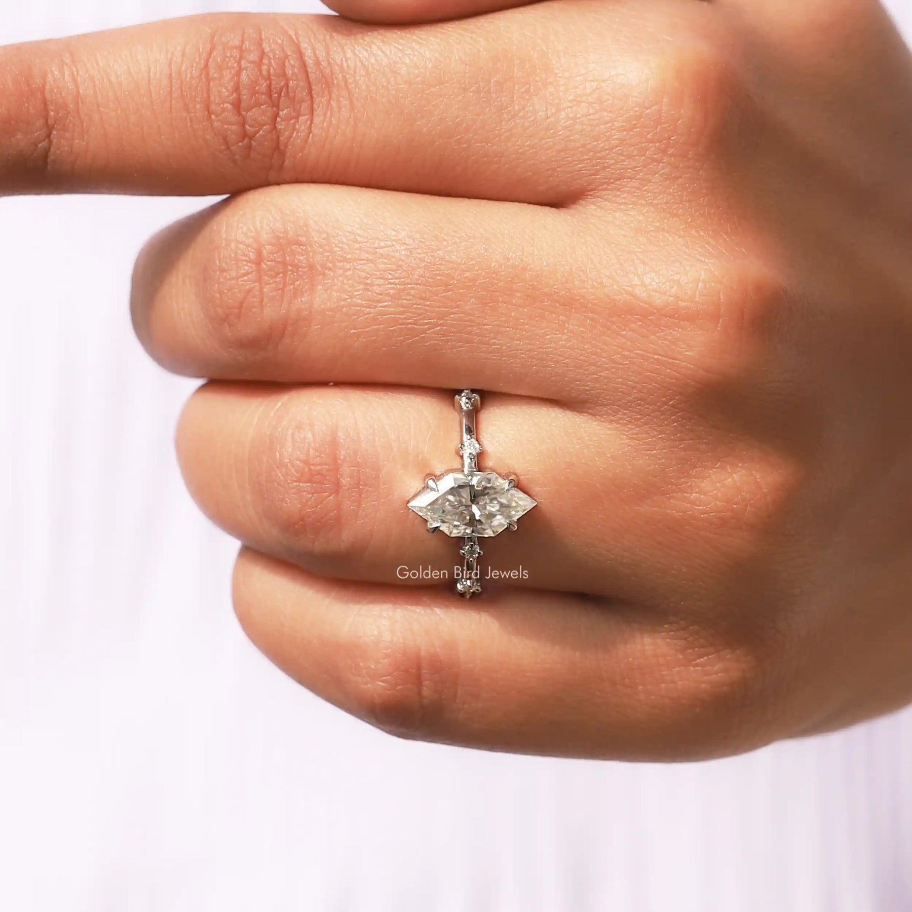 Close View of Dutch Marquise Cut Eternity Engagement Ring in a finger