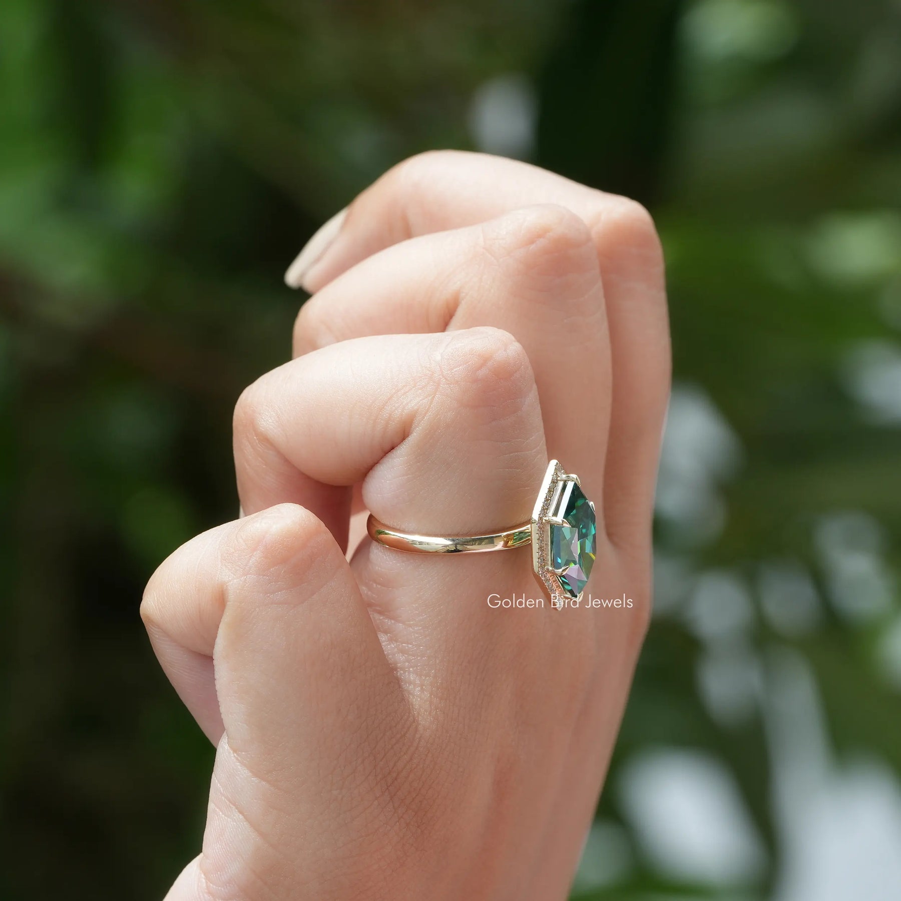 View of Marquise Cut Halo Engagement Ring In Yellow Gold