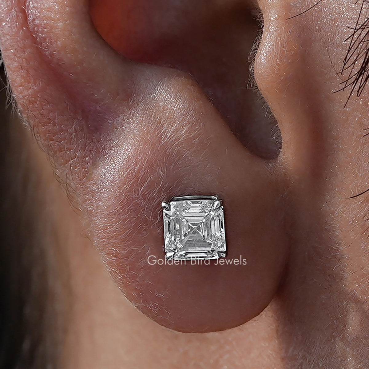 Close Up View Of Asscher Cut Diamond Solitaire Stud Earrings