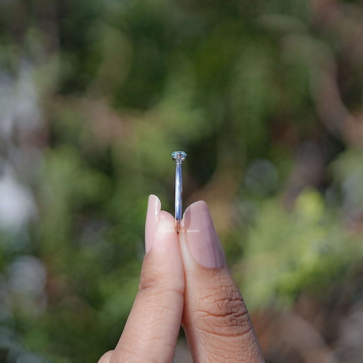 Side View of East West Marquise Cut Moissanite Solitaire Ring