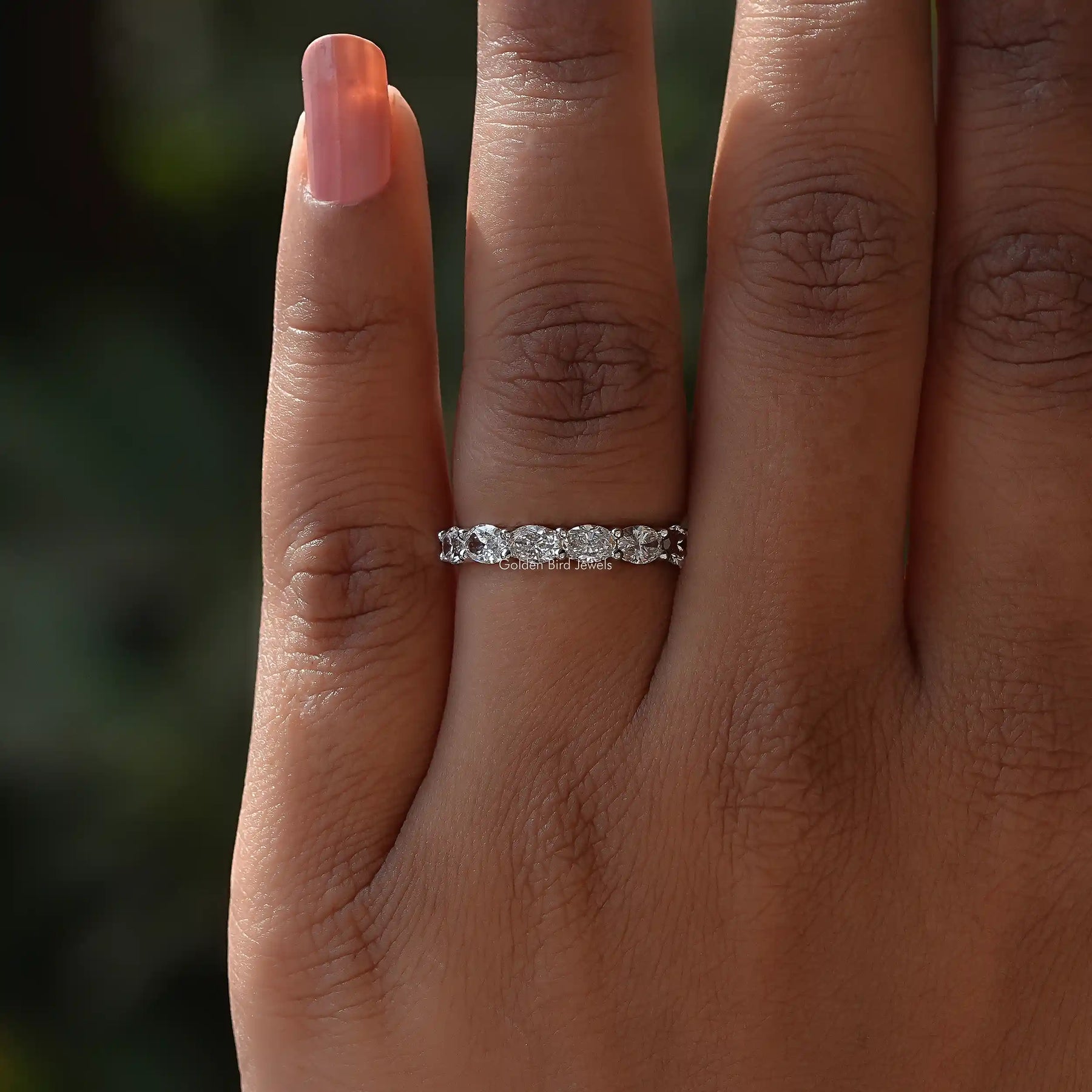 View of Oval Cut Lab Diamond Eternity Wedding Band In White Gold