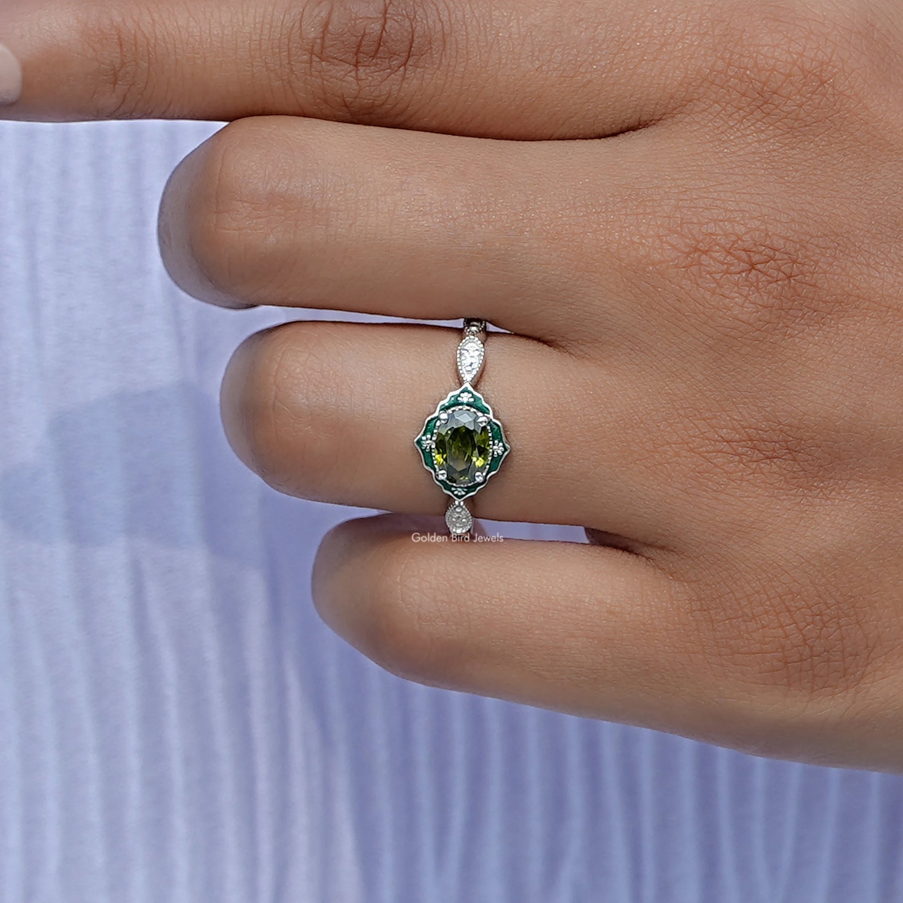 Close-Up View of East West Oval Cut Engagement Ring In White Gold