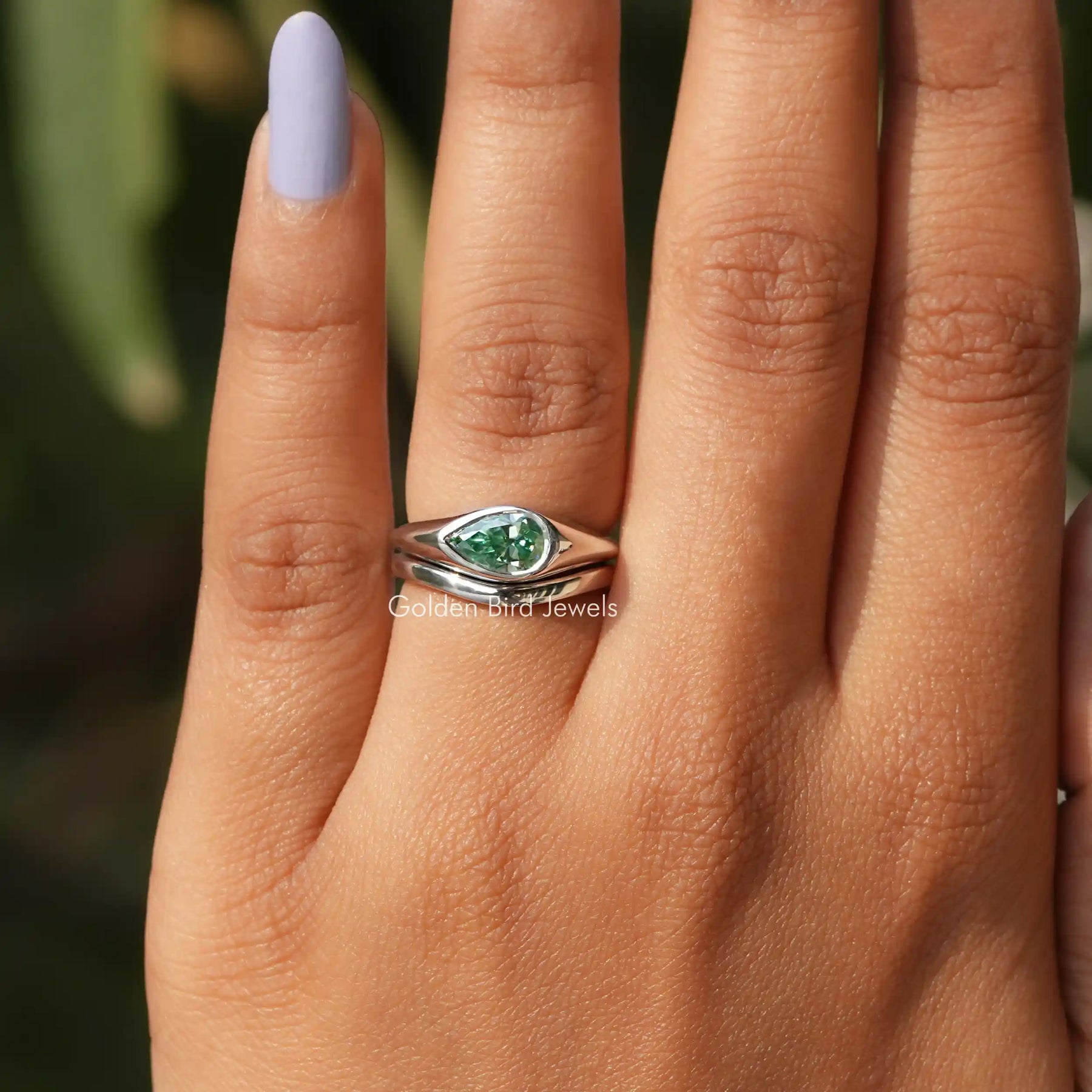 Detailed View Of Moissanite East West Pear Cut Solitaire Ring In White Gold