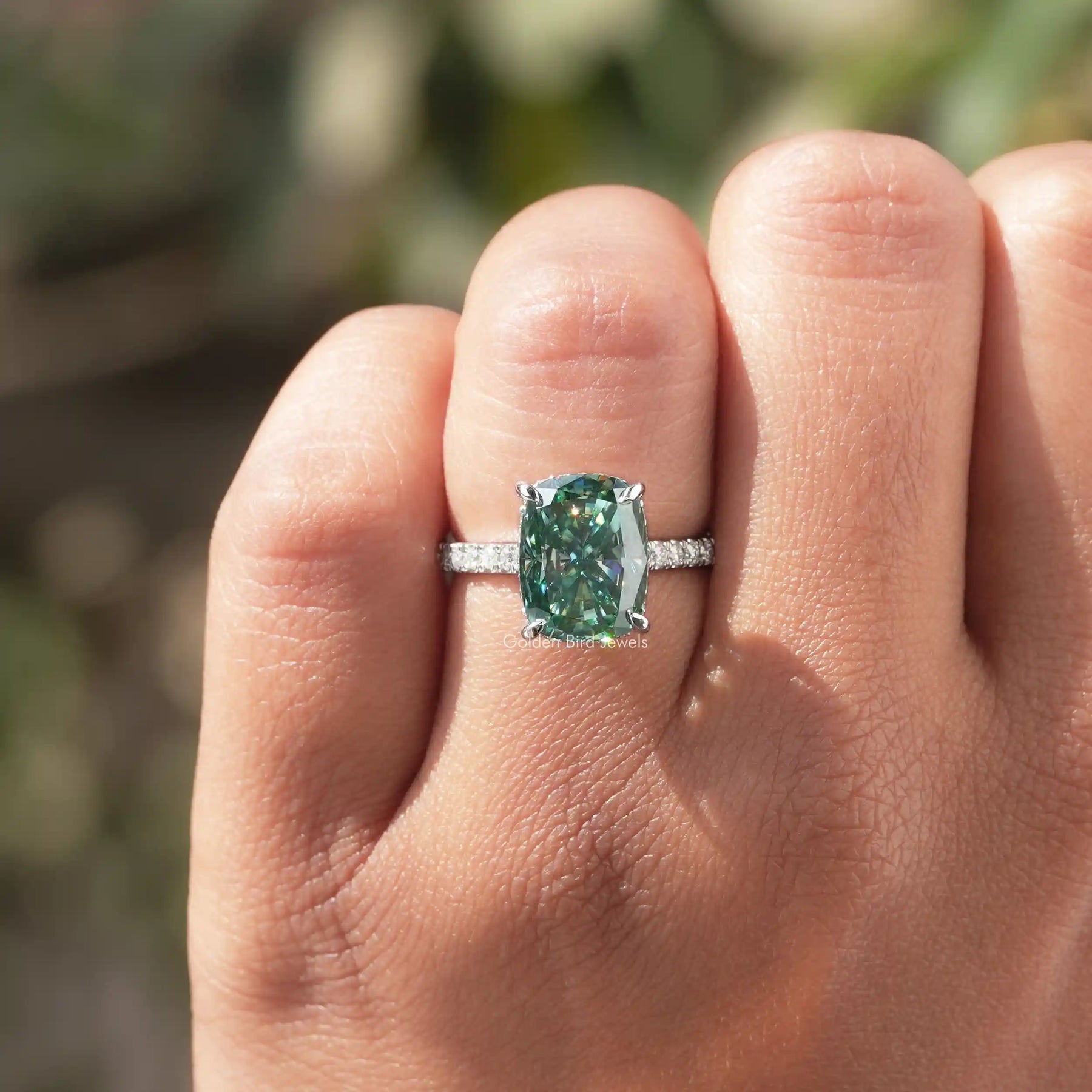 View of Elongated Cushion Cut Moissanite Ring In finger
